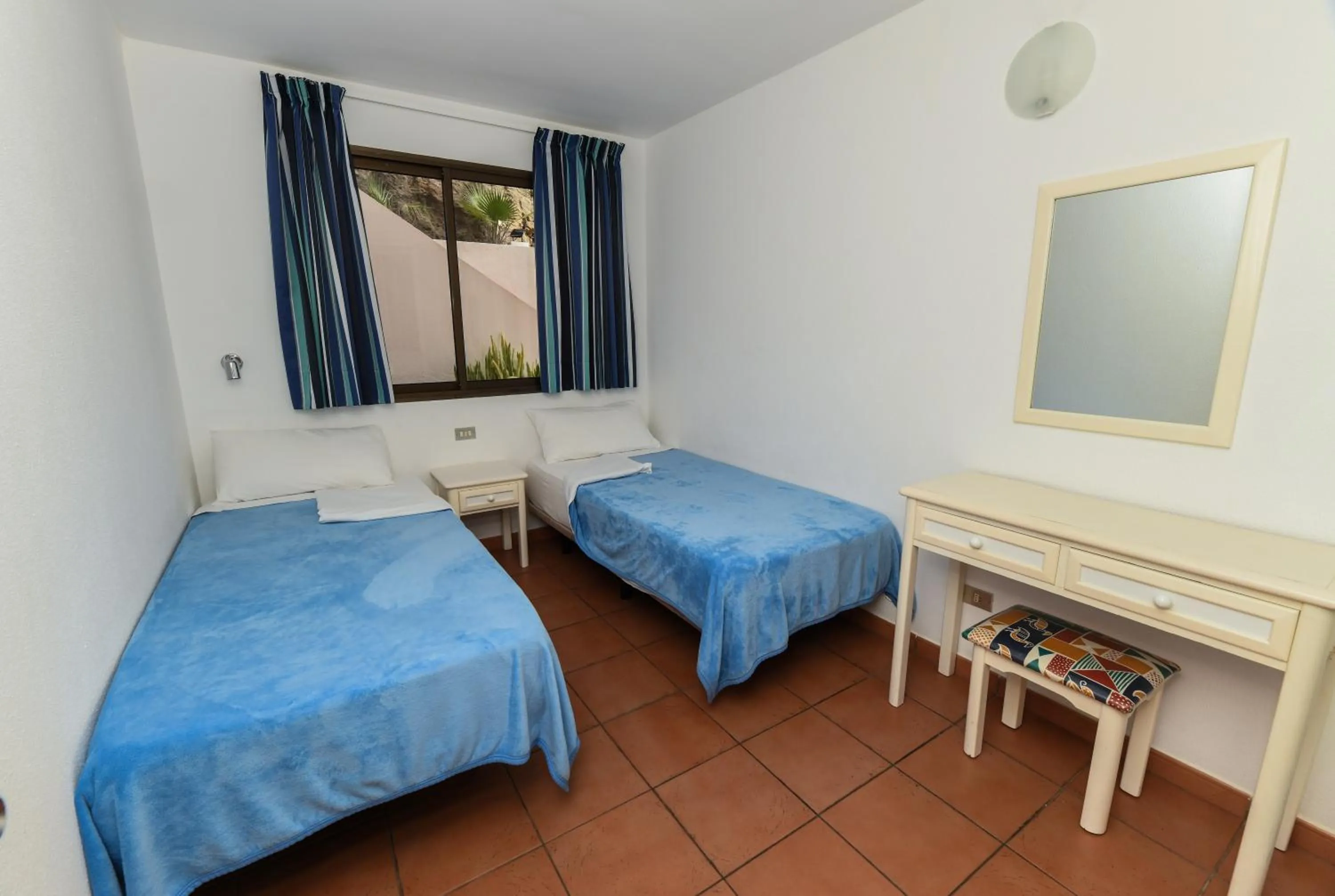 Bedroom, Bed in Apartamentos LIVVO Puerto Bello