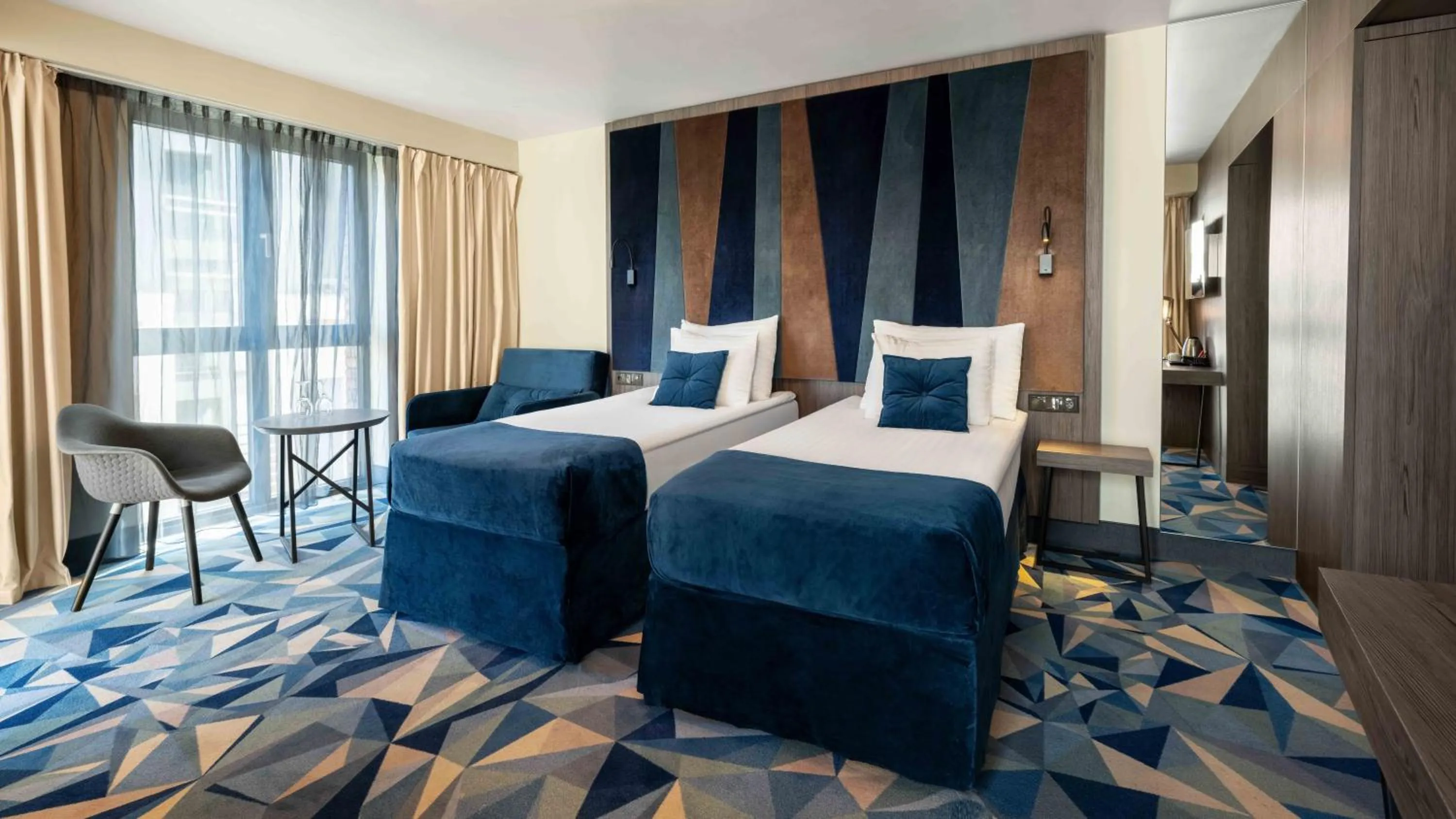 Bed in Wellton Riverside SPA Hotel