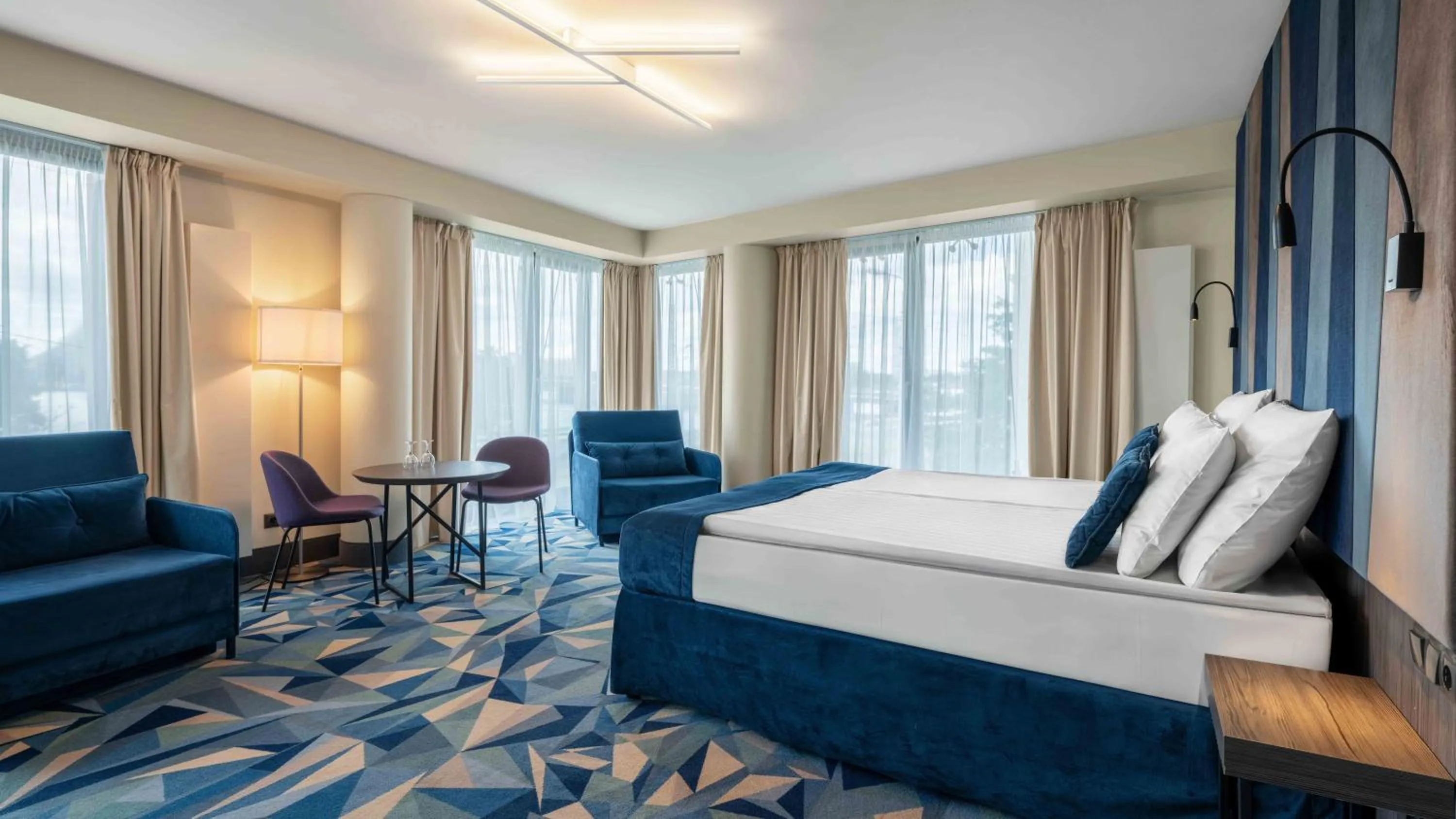 Bed in Wellton Riverside SPA Hotel