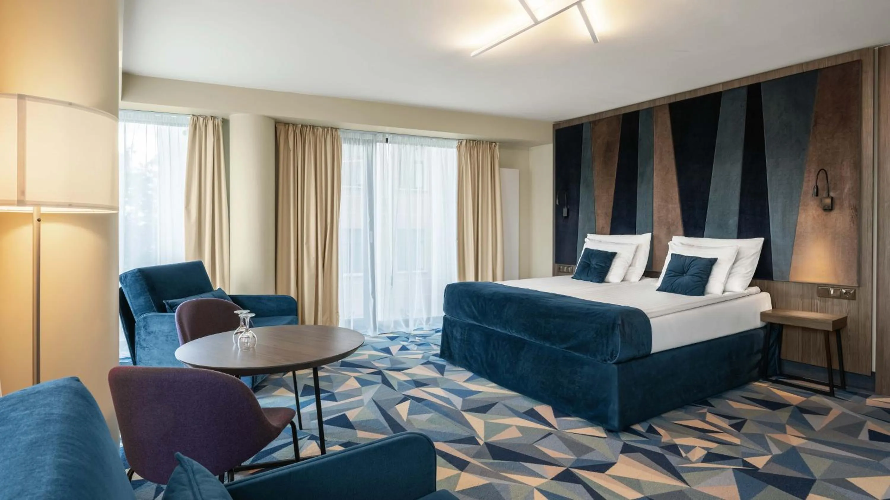 Bed in Wellton Riverside SPA Hotel