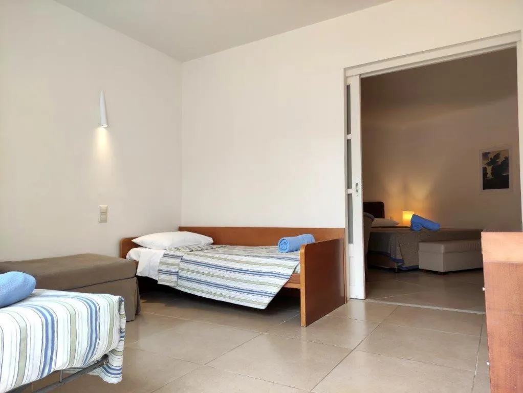 Bedroom, Bed in Apollonia Beach Resort & Spa