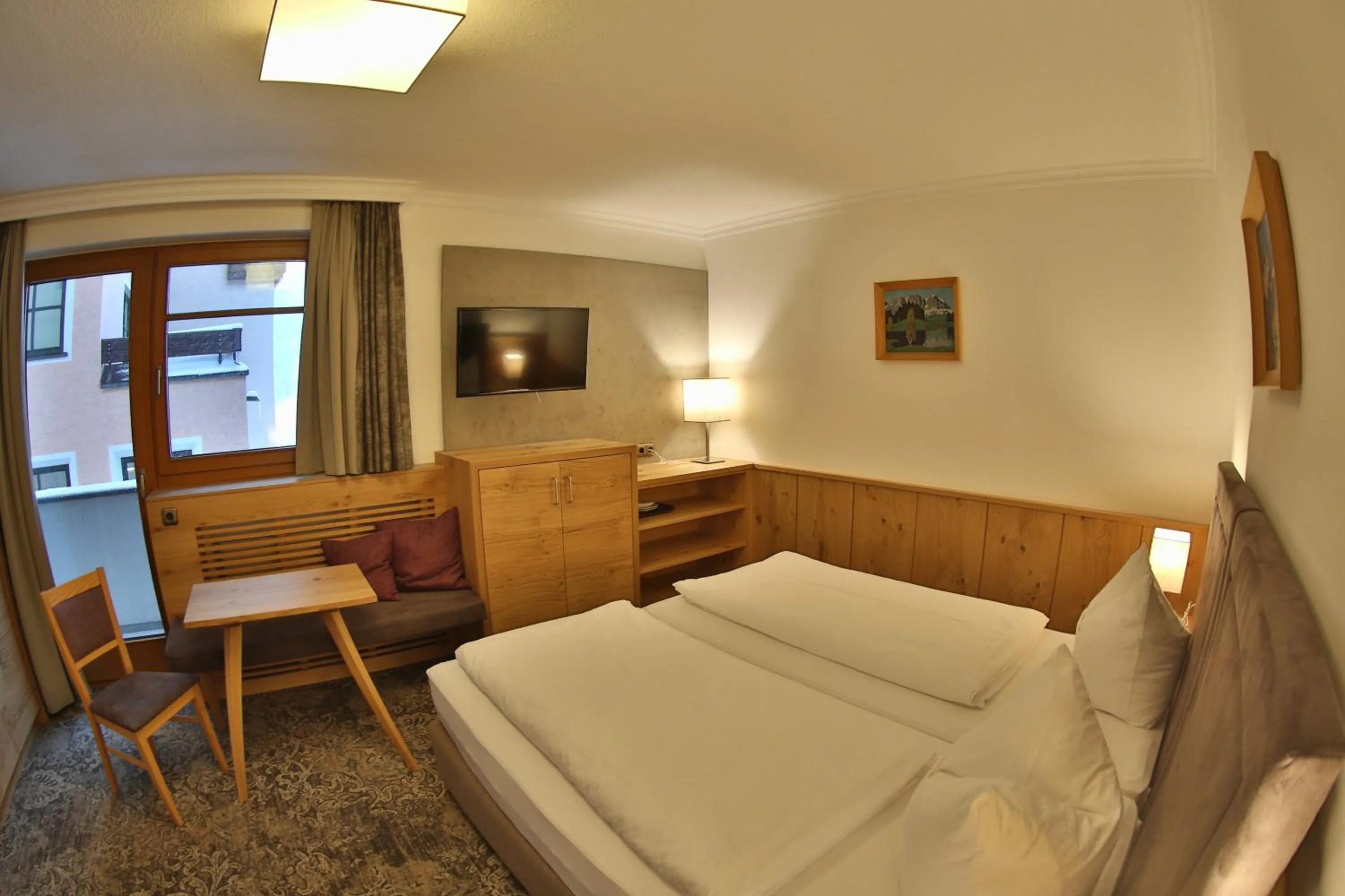 Bed in Aparthotel Acksteiner