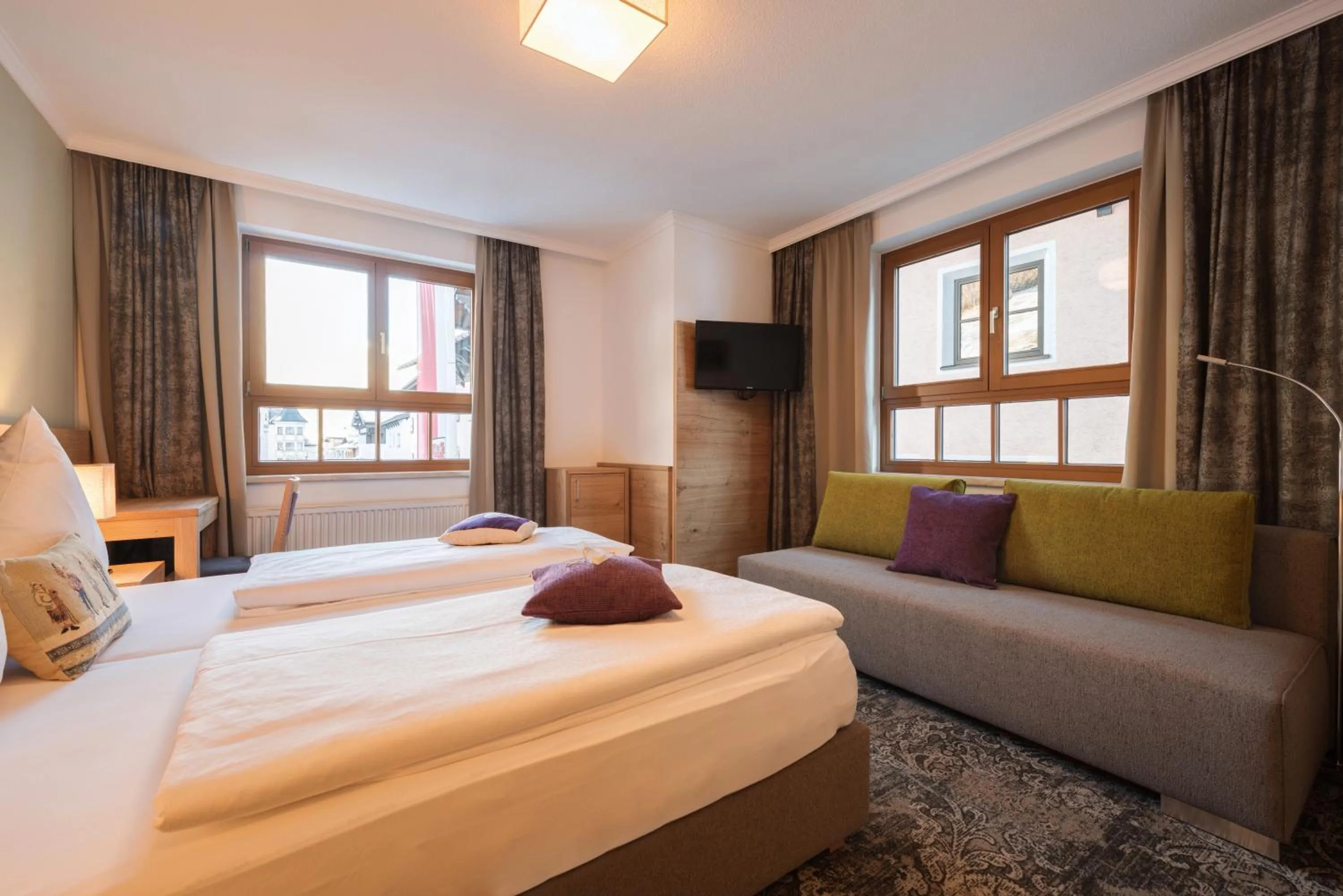 Bed in Aparthotel Acksteiner