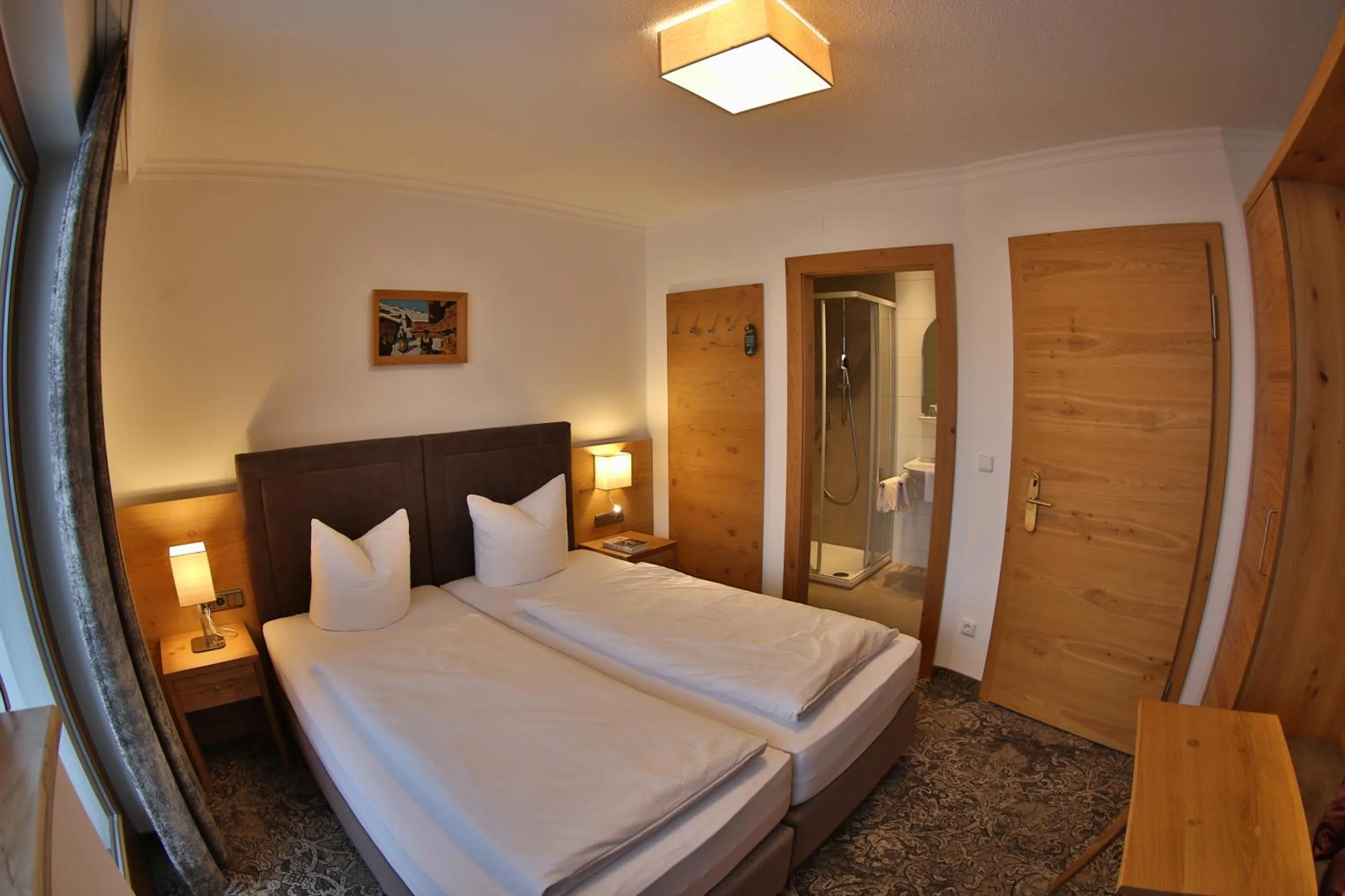 Bed in Aparthotel Acksteiner