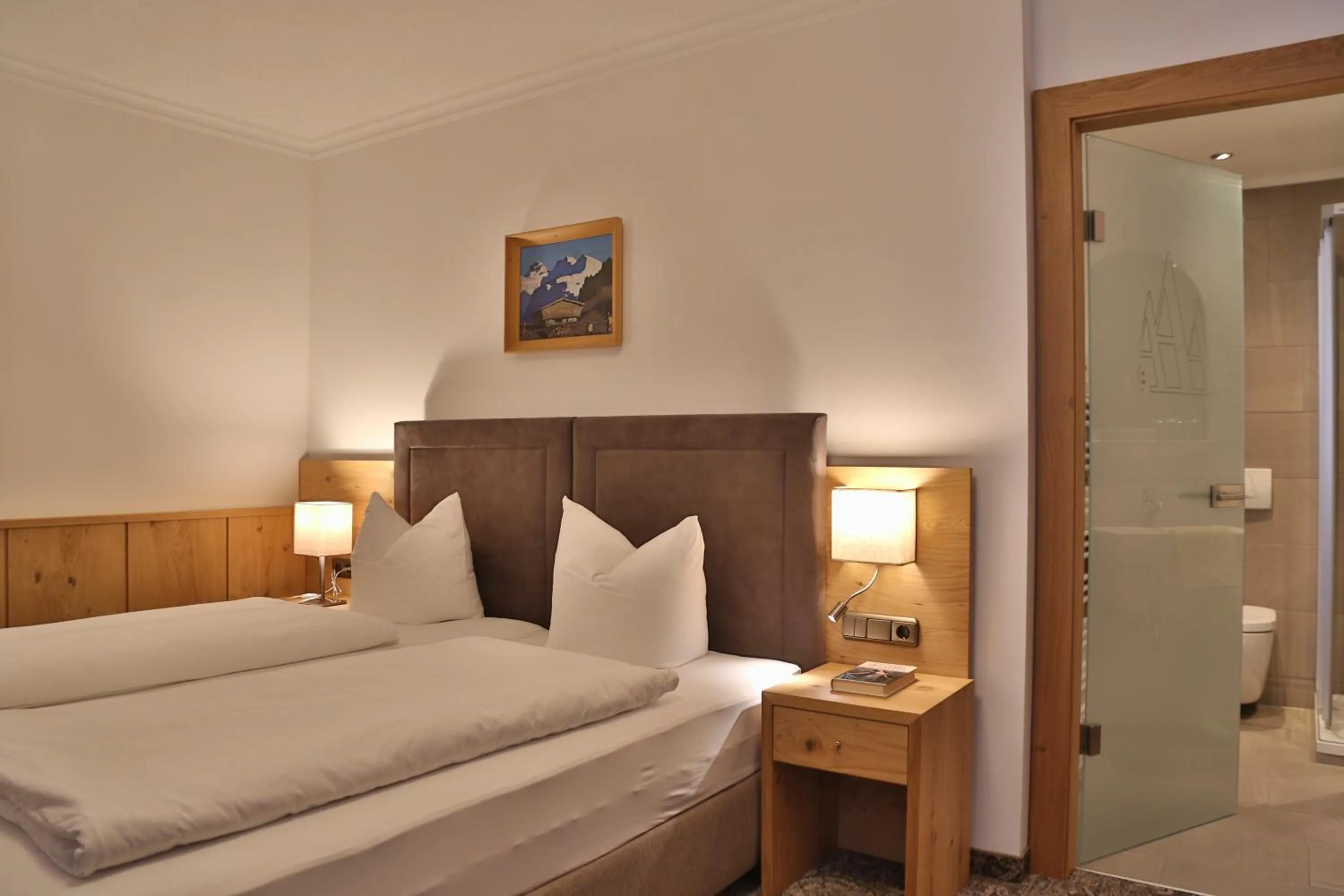 Bed in Aparthotel Acksteiner