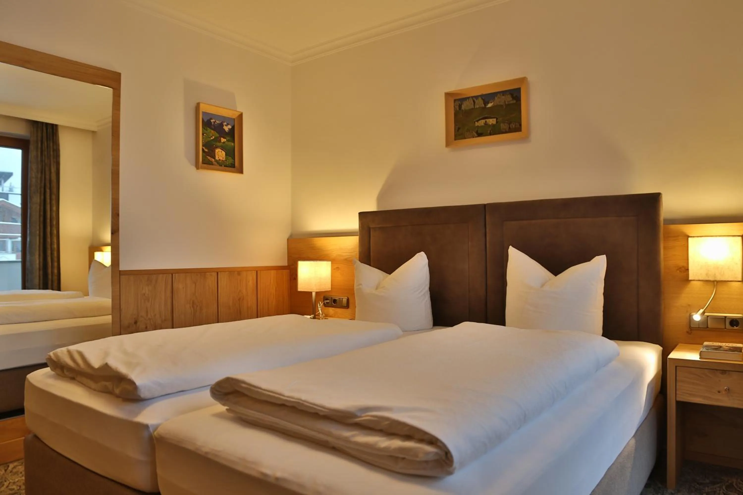 Bed in Aparthotel Acksteiner