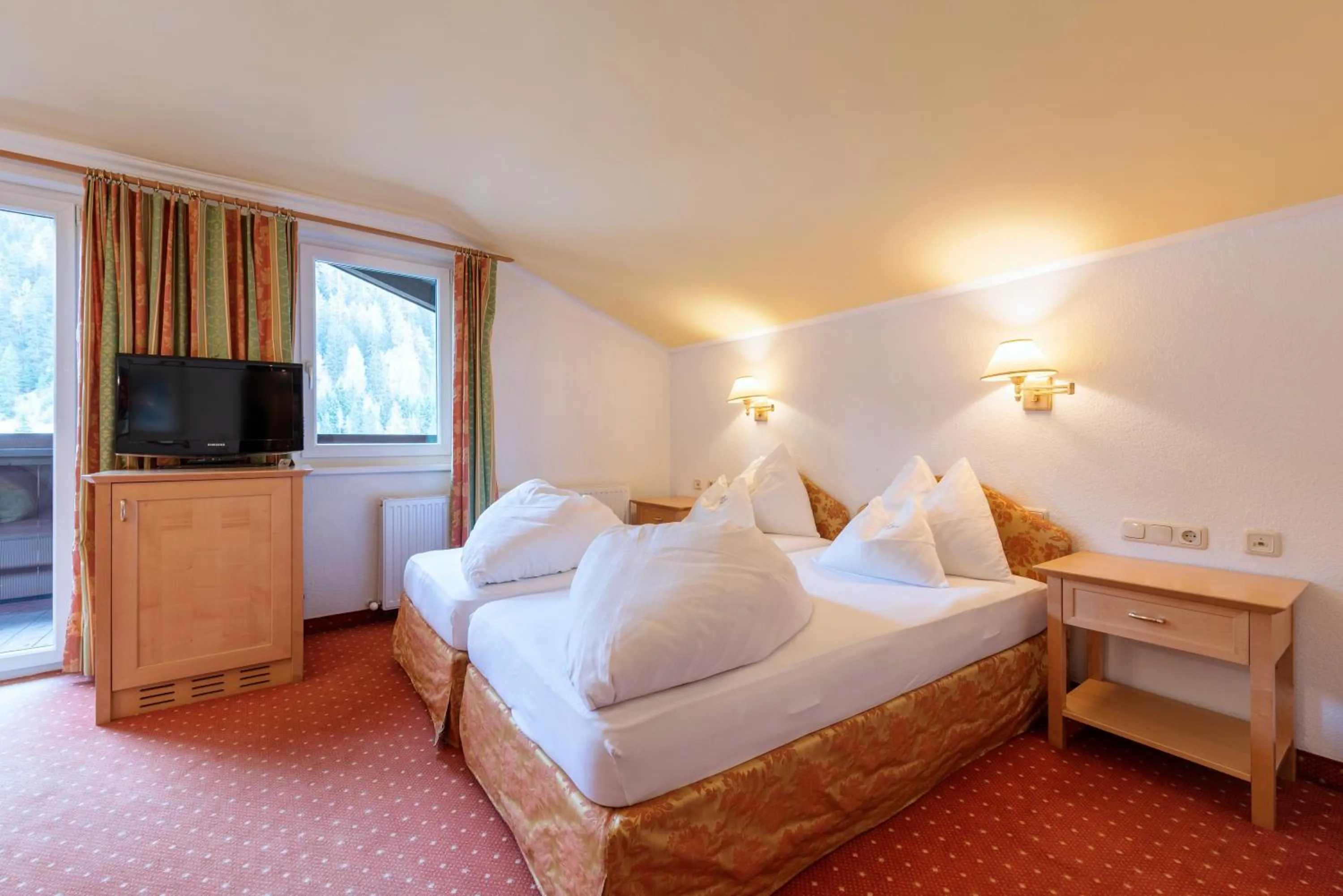 Bed in Heart Hotel Arlberg