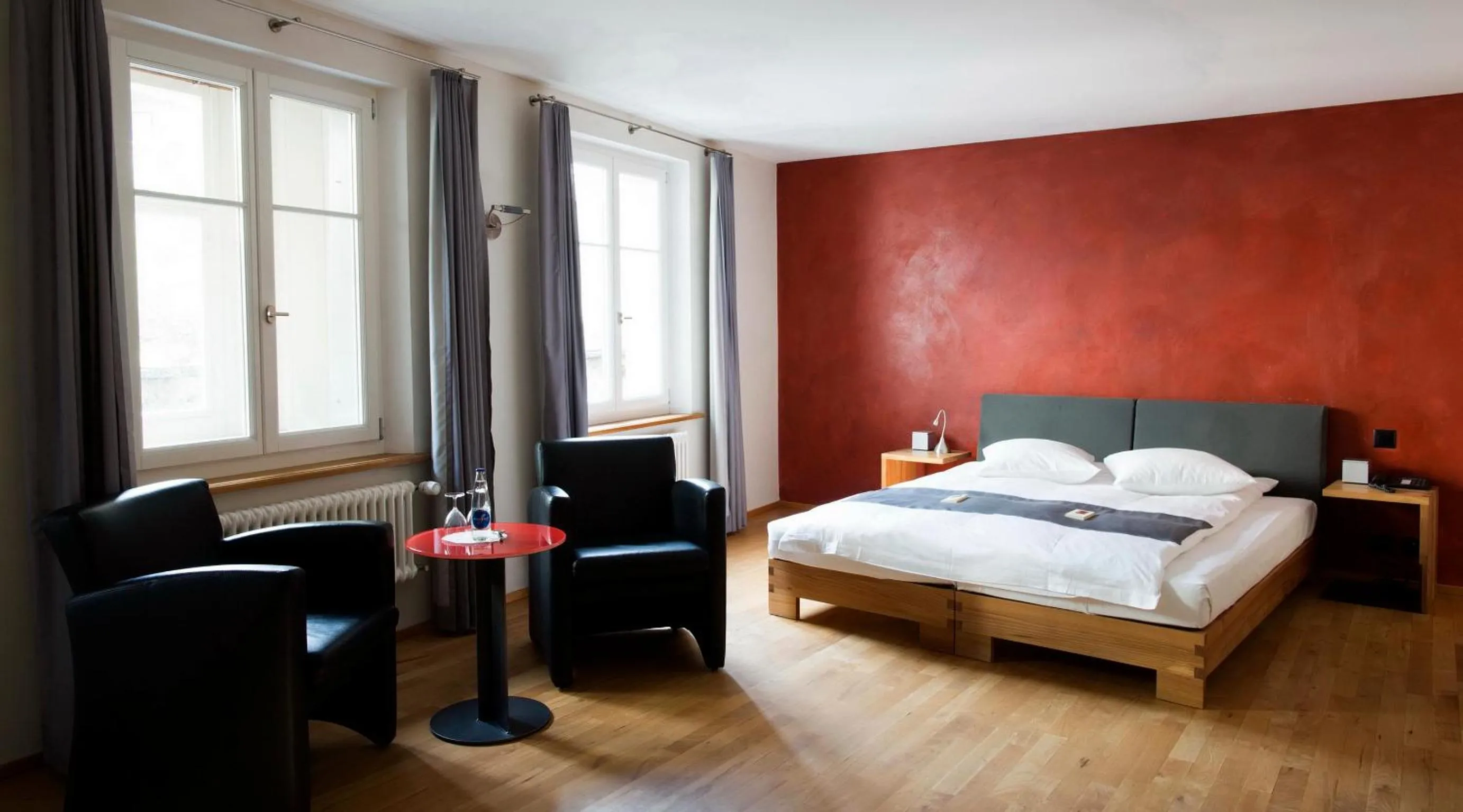 Bed in Hotel Le Lion - Self Check-in