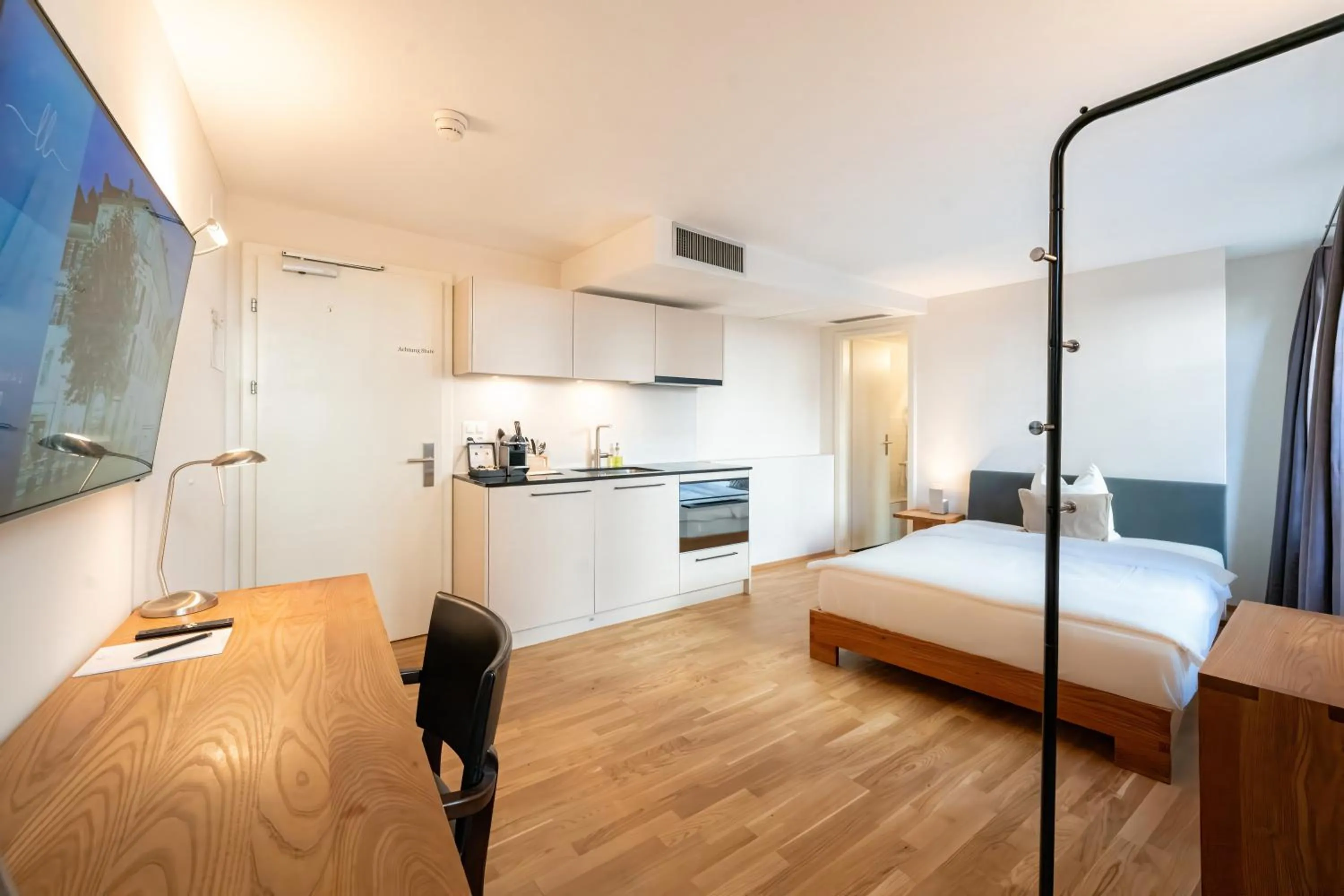 Bed in Hotel Le Lion - Self Check-in