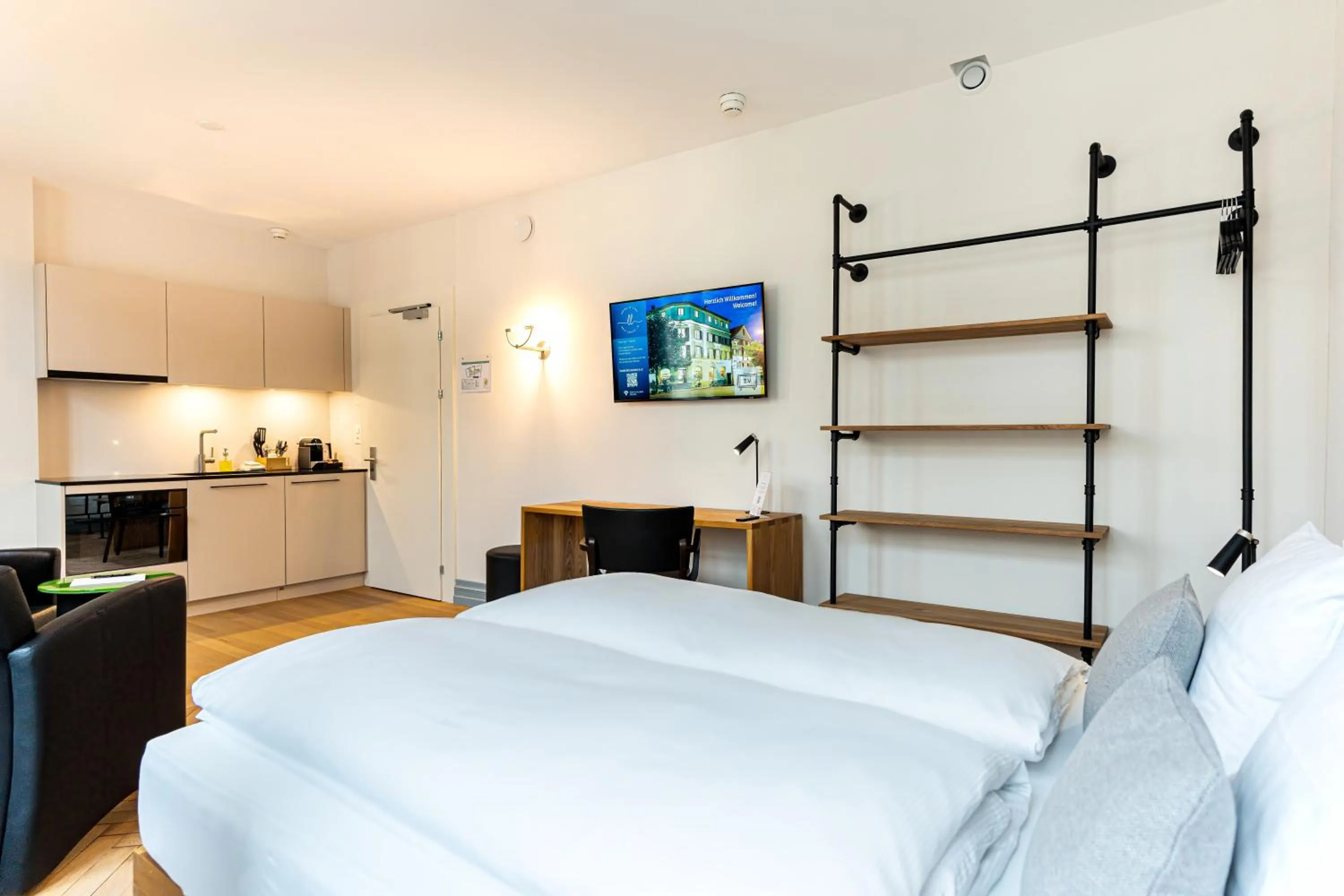 Bed in Hotel Le Lion - Self Check-in