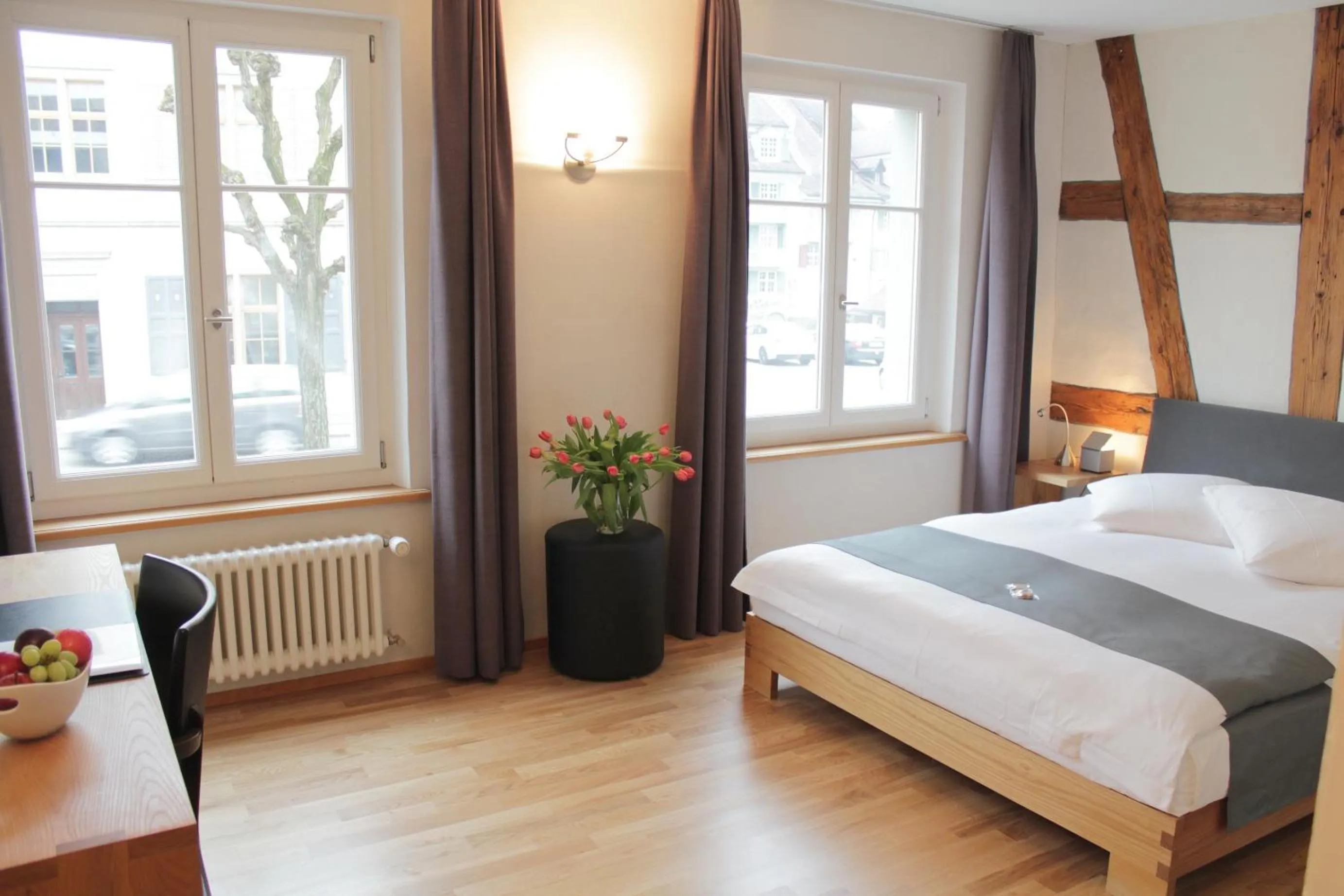 Bed in Hotel Le Lion - Self Check-in