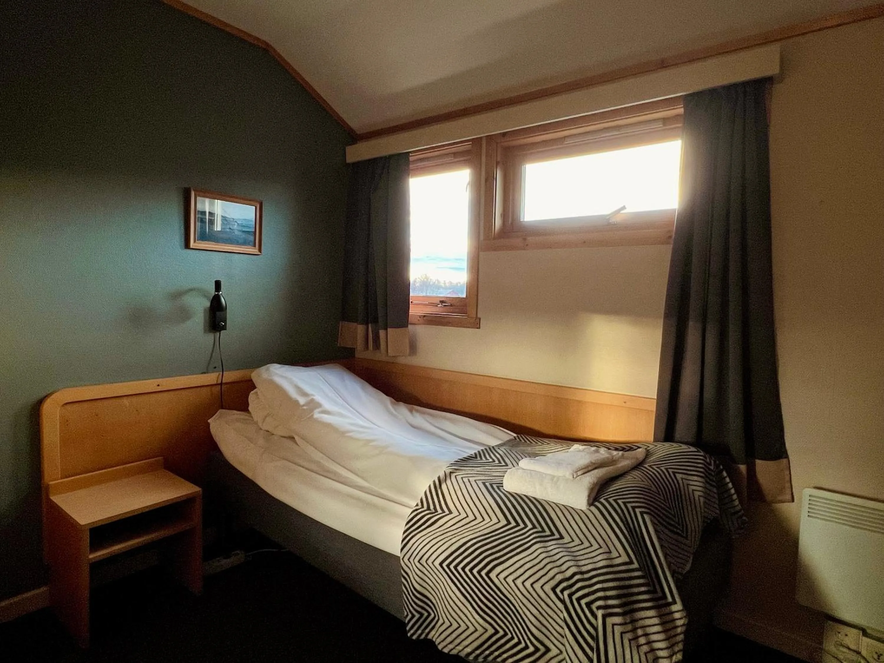 Photo of the whole room, Bed in Lakselv Hotel