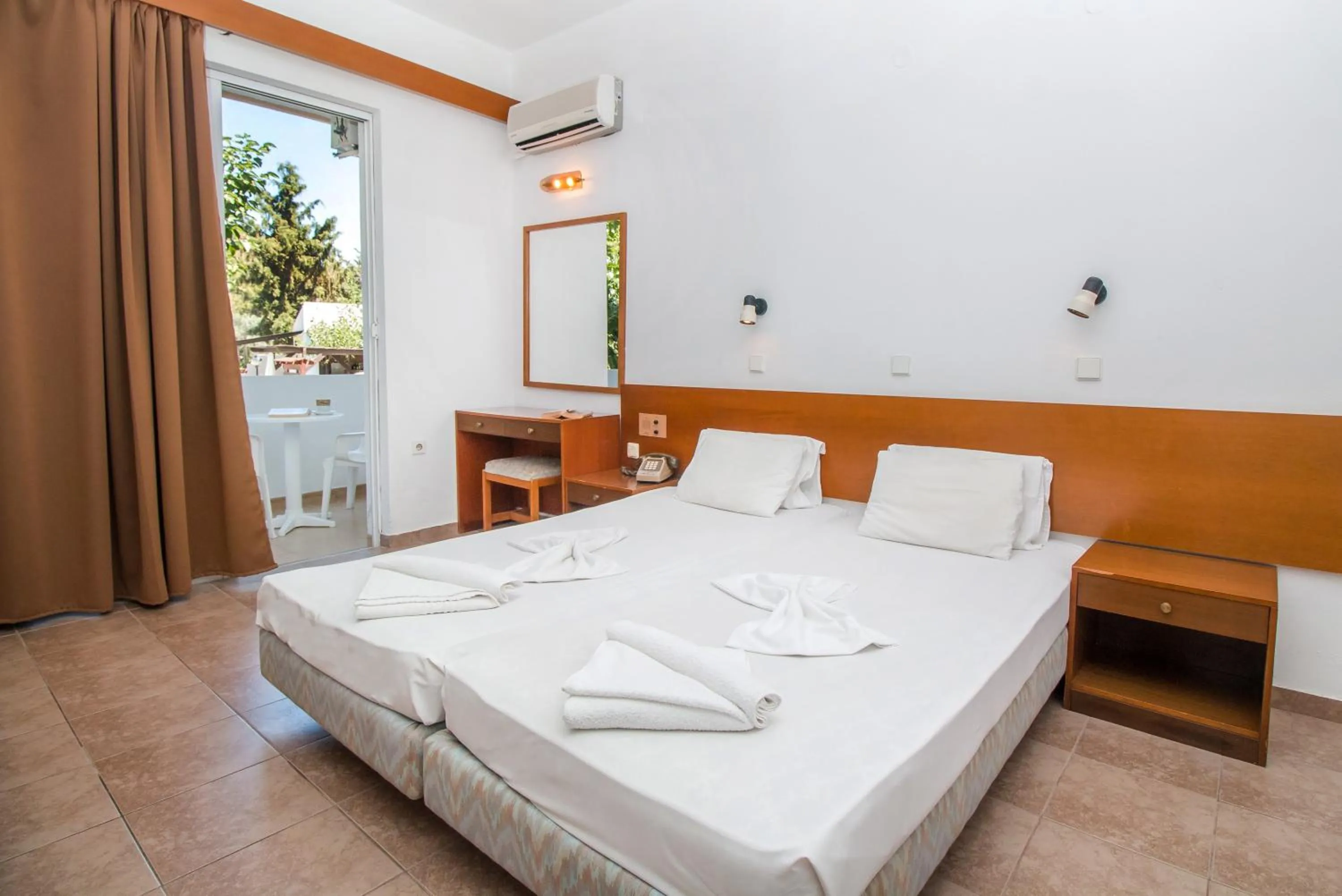 Bedroom in Achousa Hotel