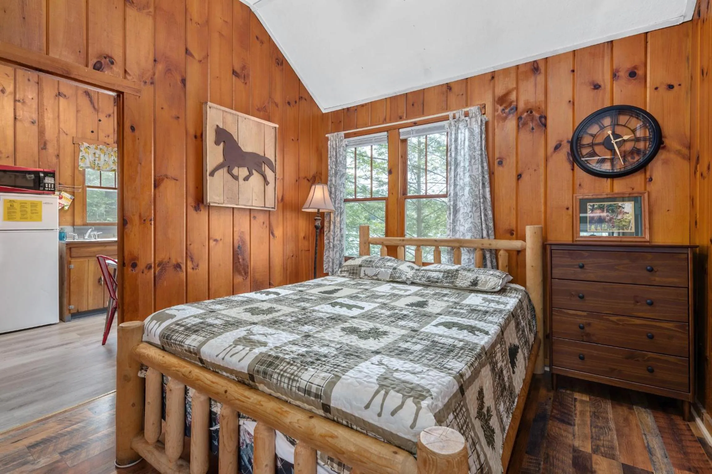 Bed in Hide-A-Way Waterfront Cottages