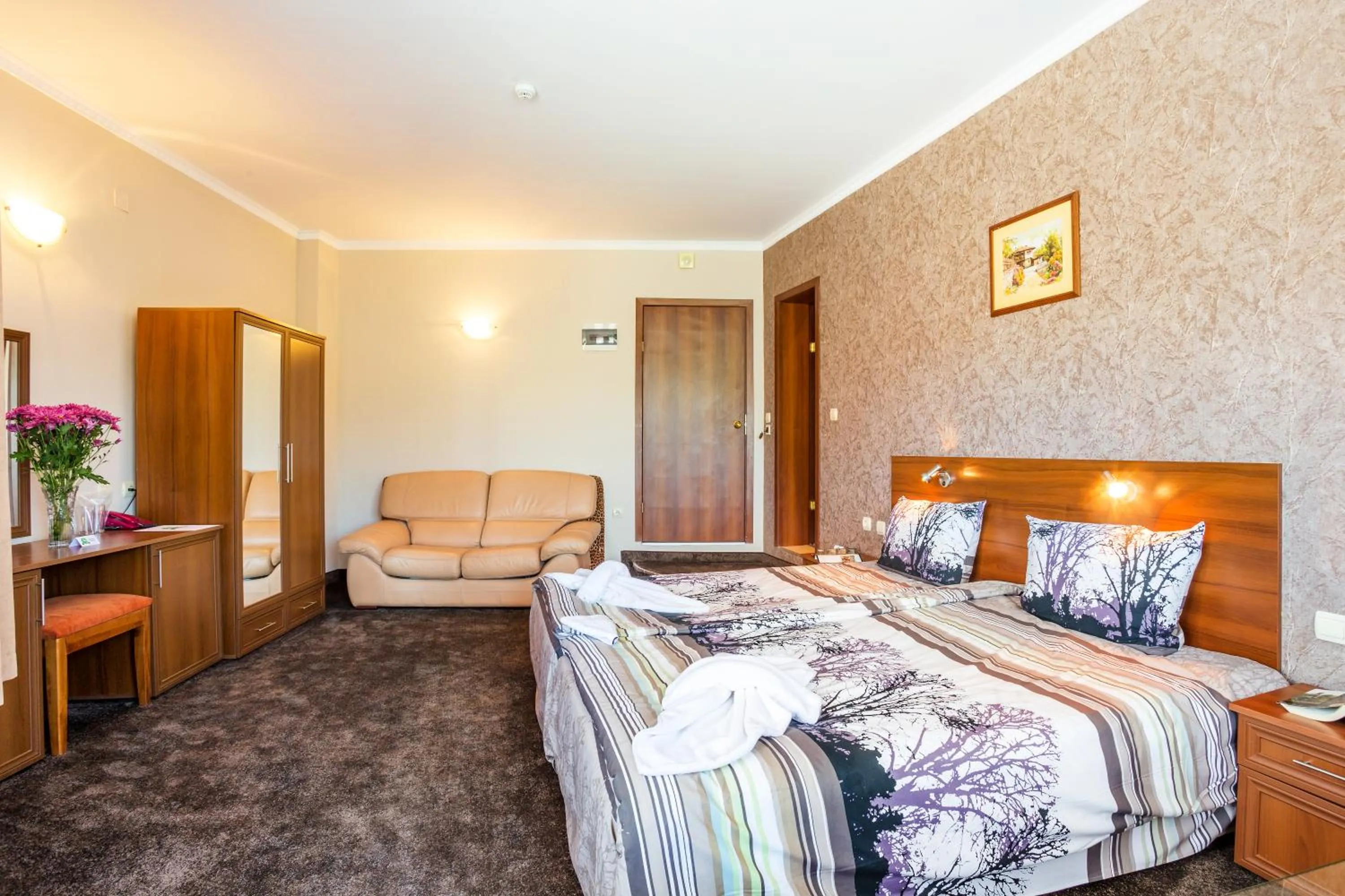 Bed in Family Hotel Romantika