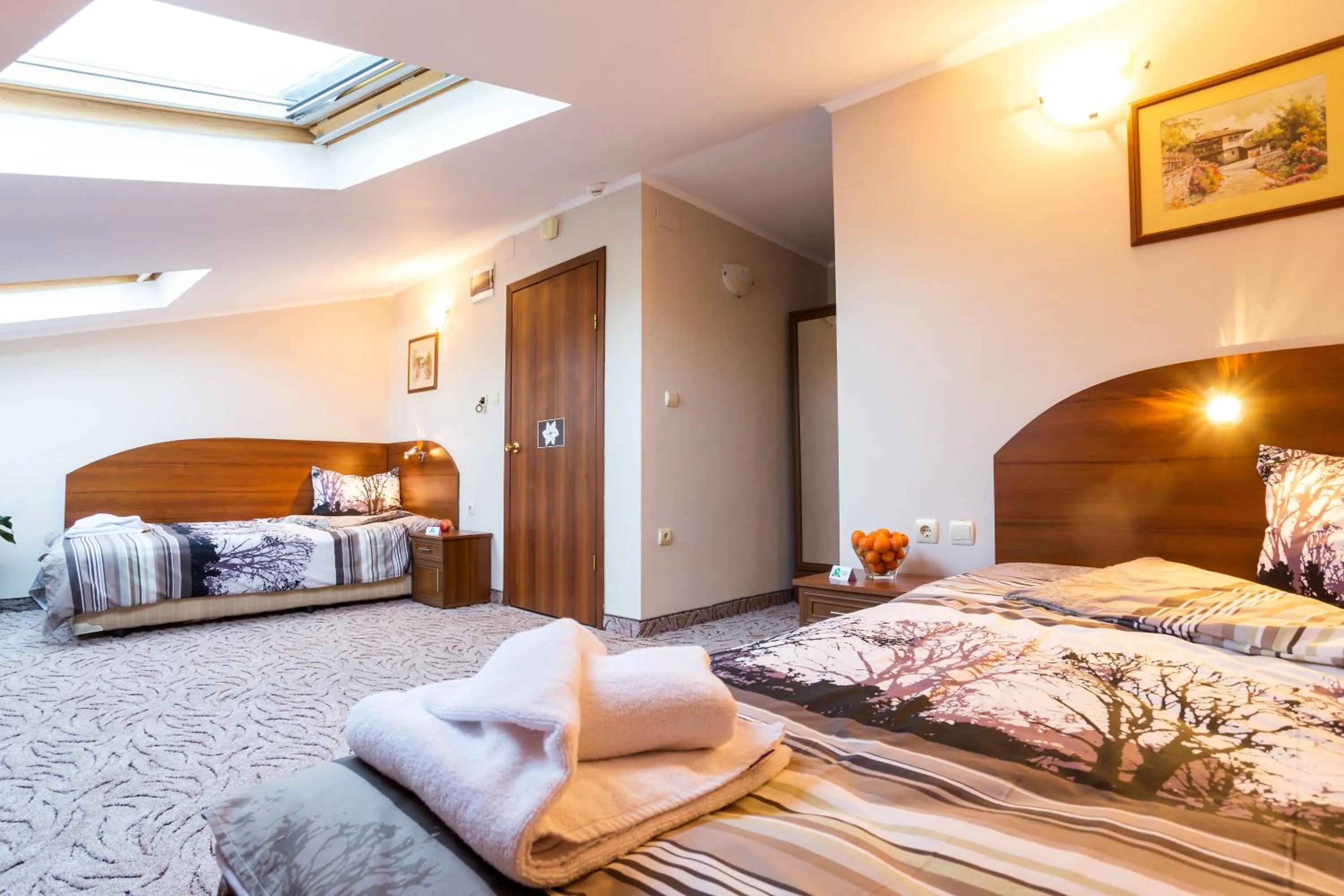 Bed in Family Hotel Romantika