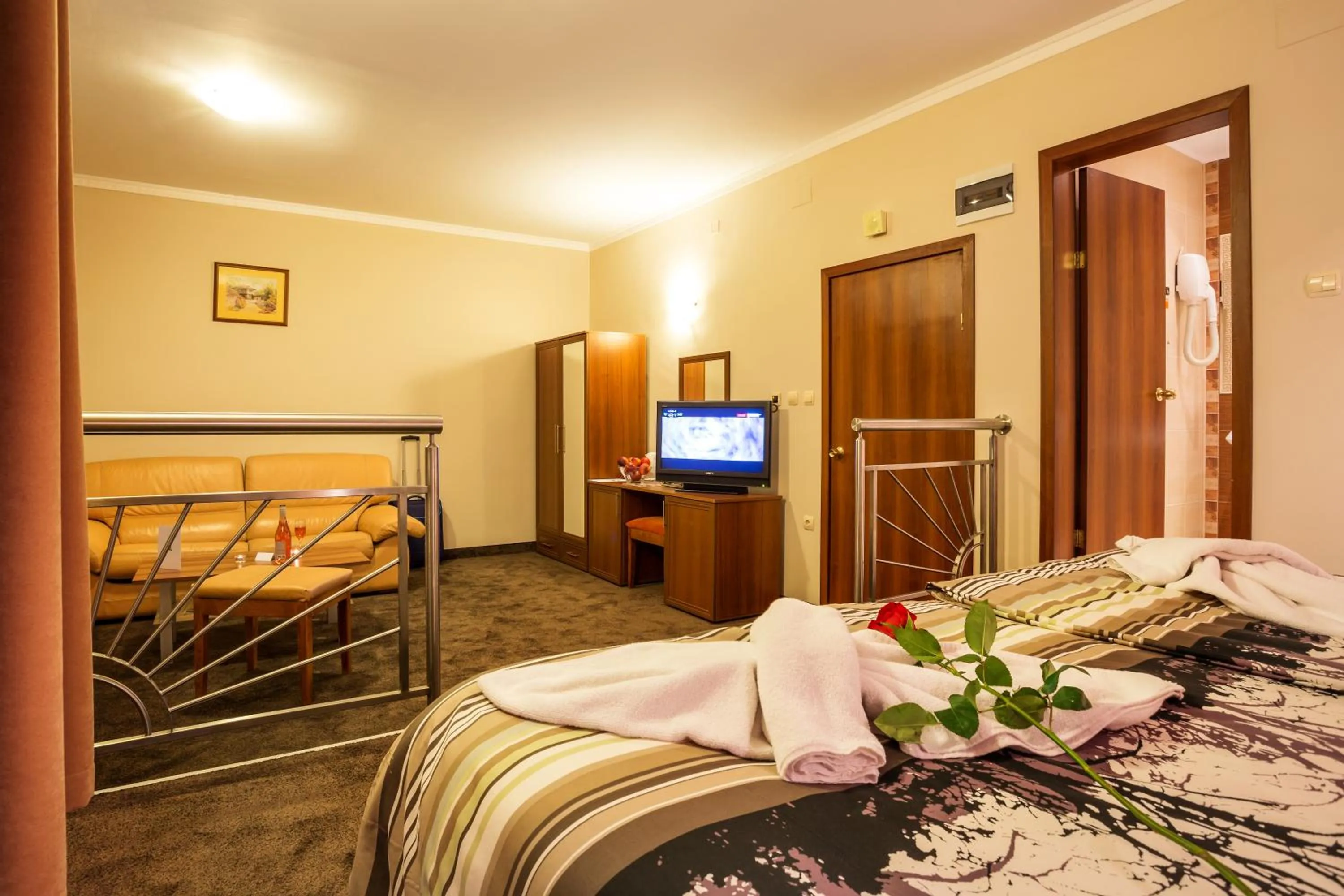 Bed in Family Hotel Romantika