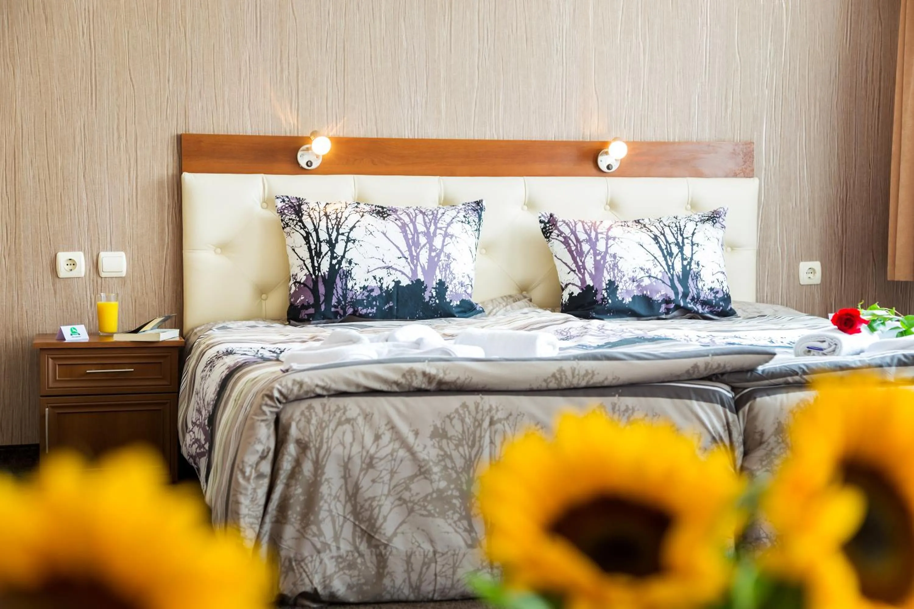 Bed in Family Hotel Romantika