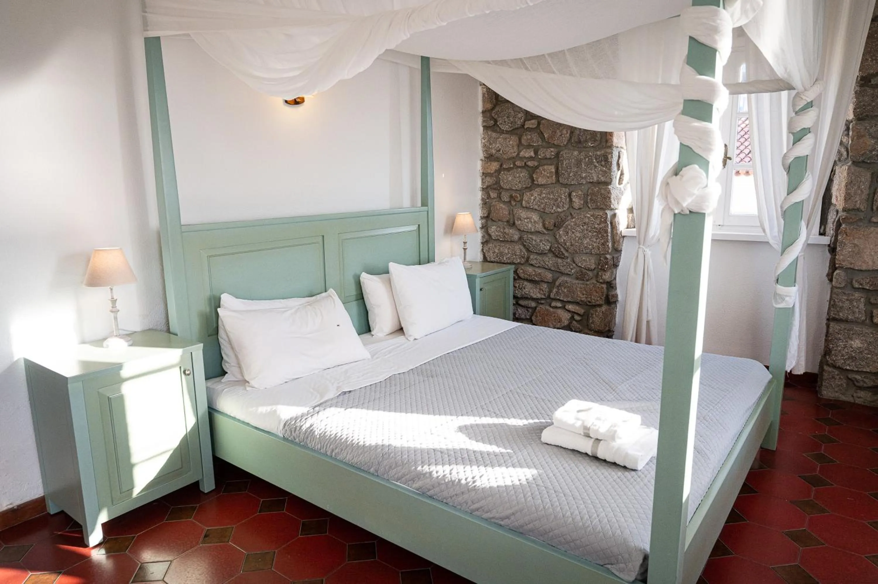 Bed in Dionysos Hotel