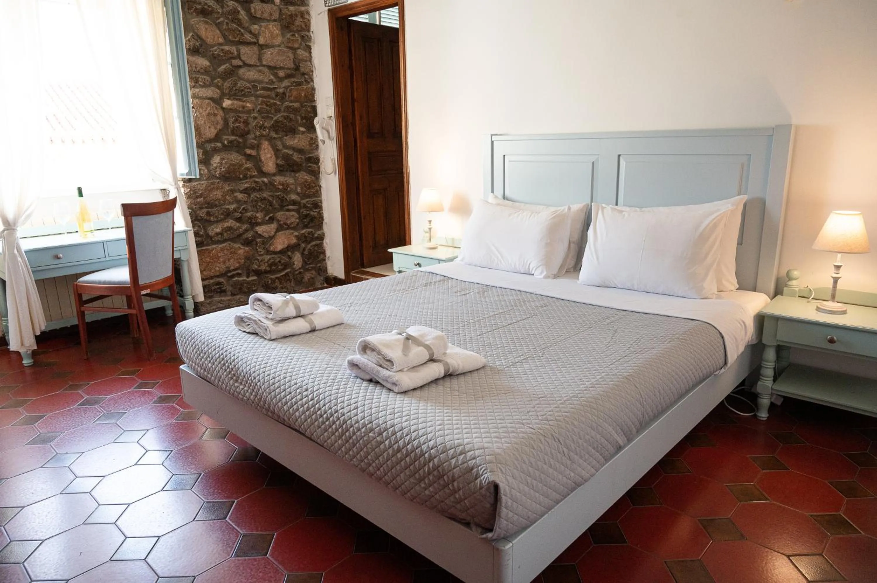Bed in Dionysos Hotel