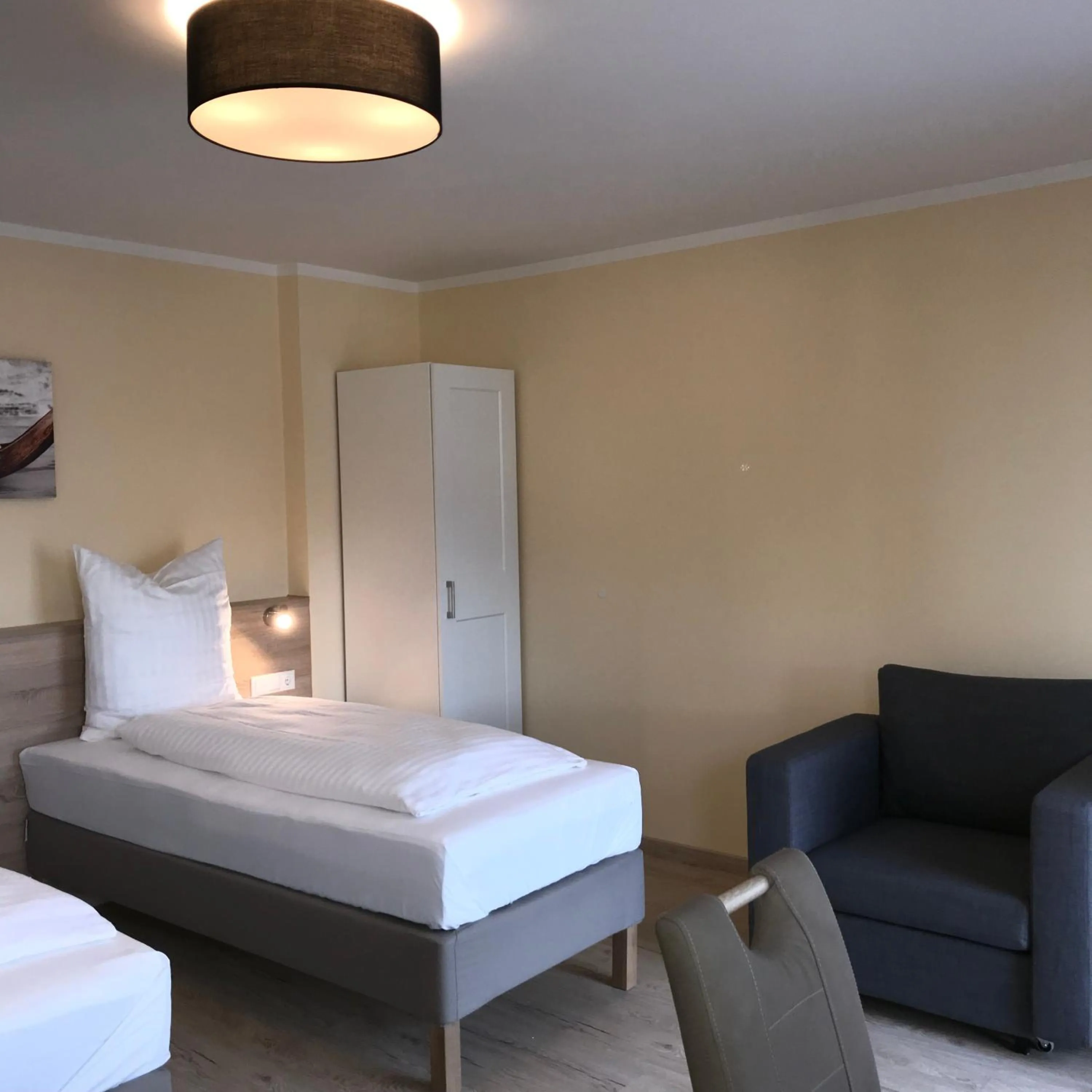 Bed in Hotel Select Suites & Aparts