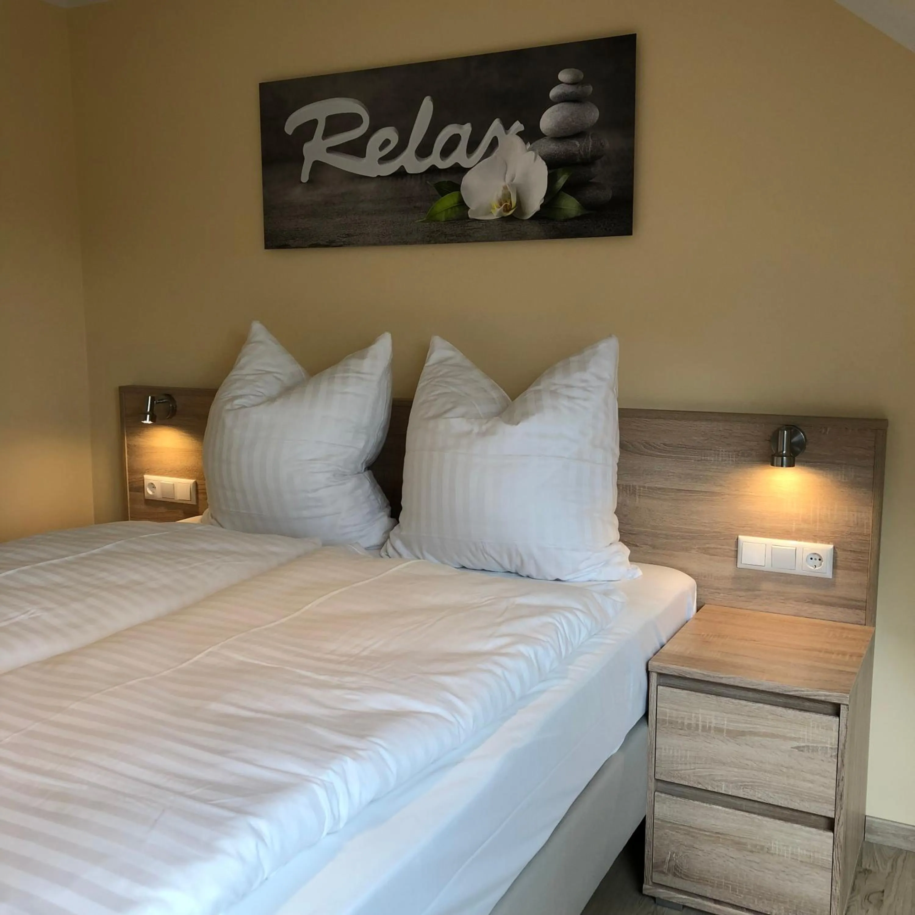 Bed in Hotel Select Suites & Aparts