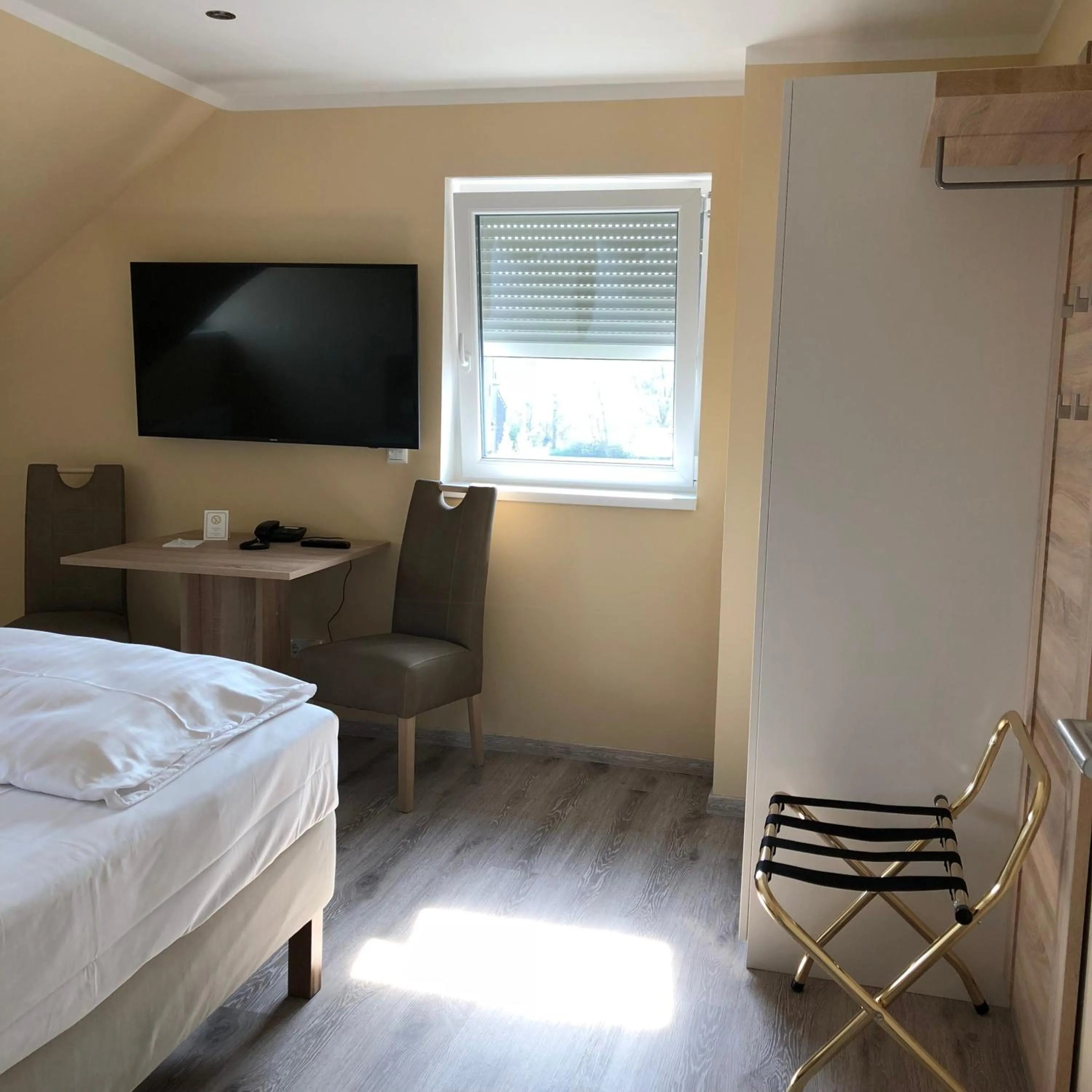 Bed in Hotel Select Suites & Aparts