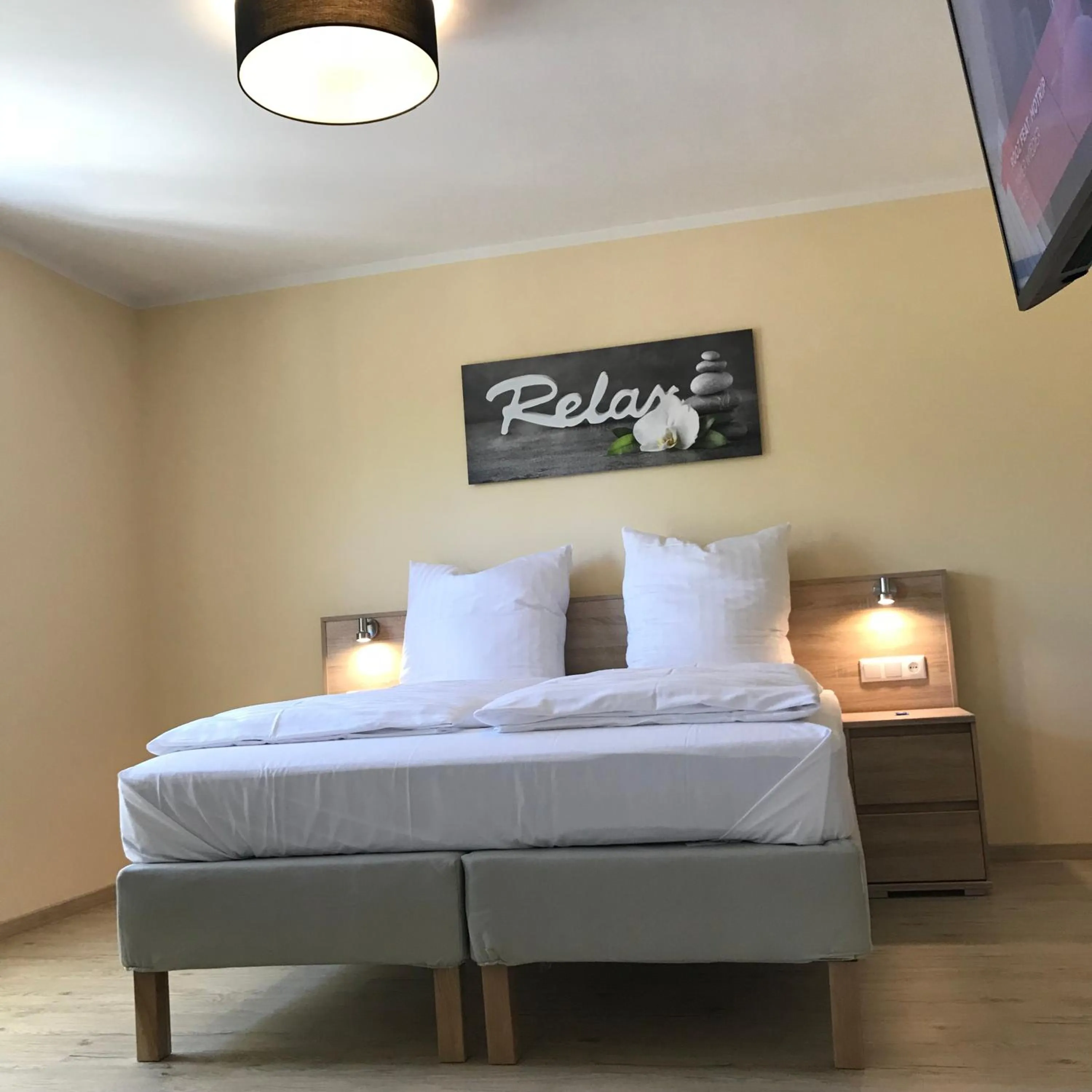 Bed in Hotel Select Suites & Aparts