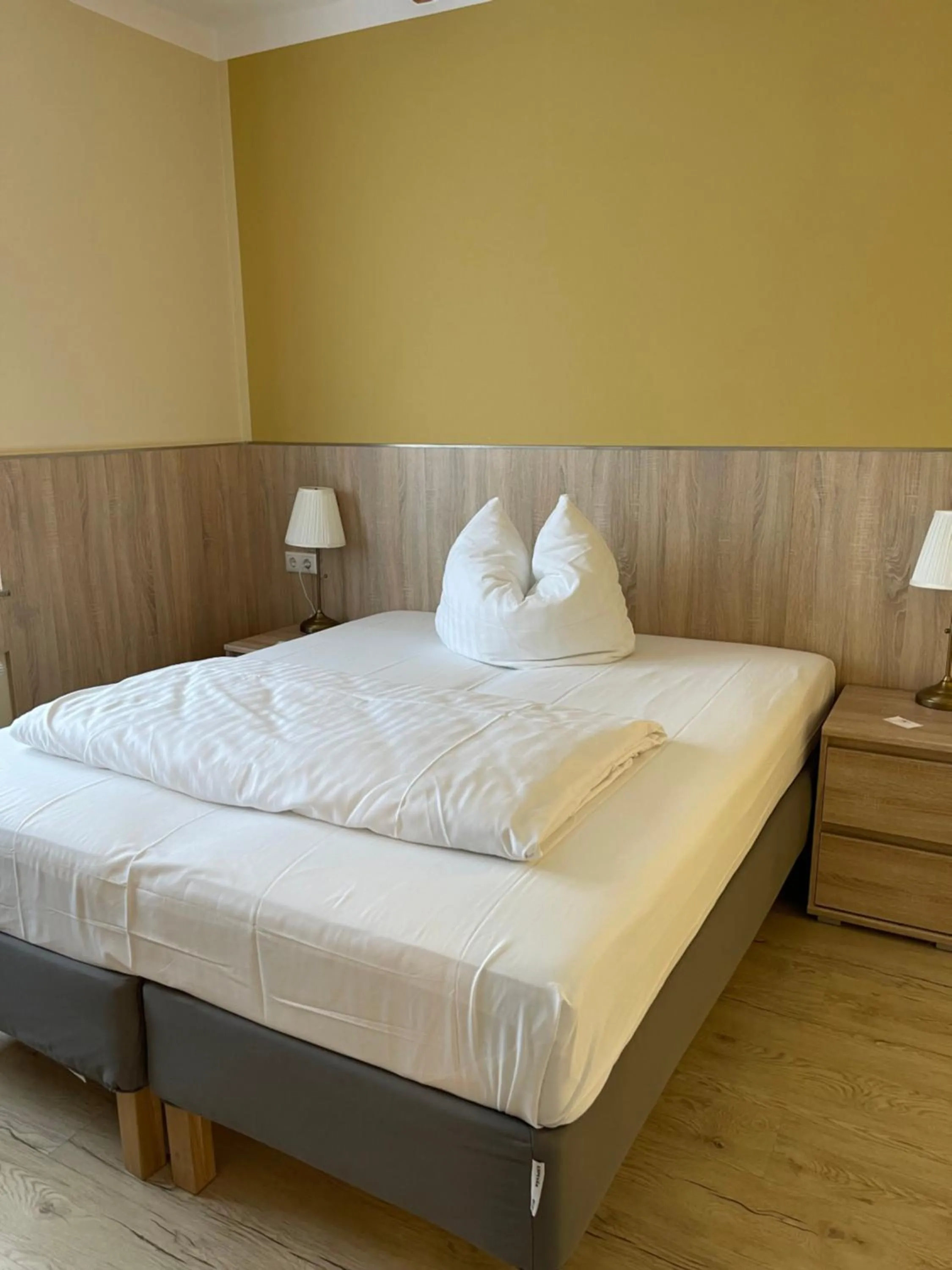 Bed in Hotel Select Suites & Aparts