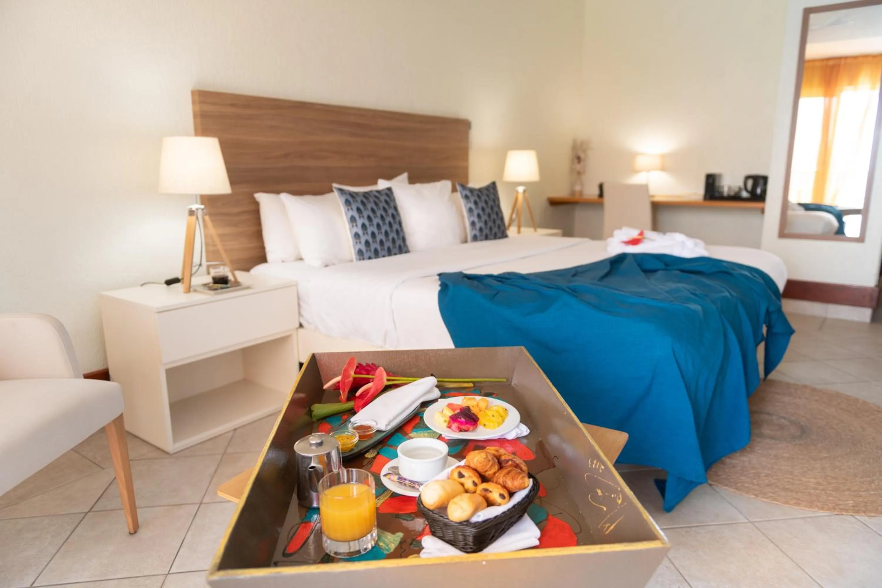 Bed in Hotel Arawak Beach Resort