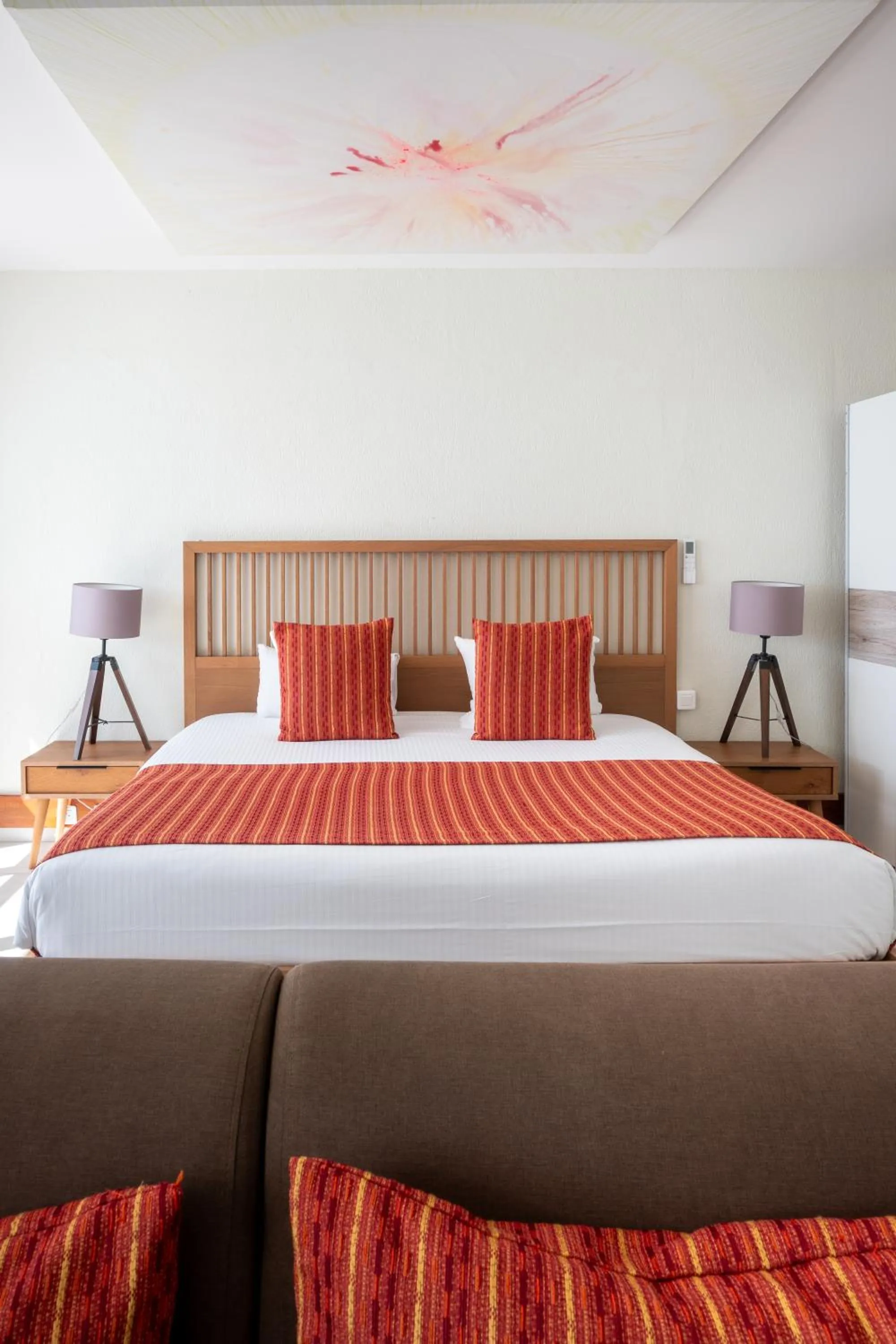 Bed in Hotel Arawak Beach Resort