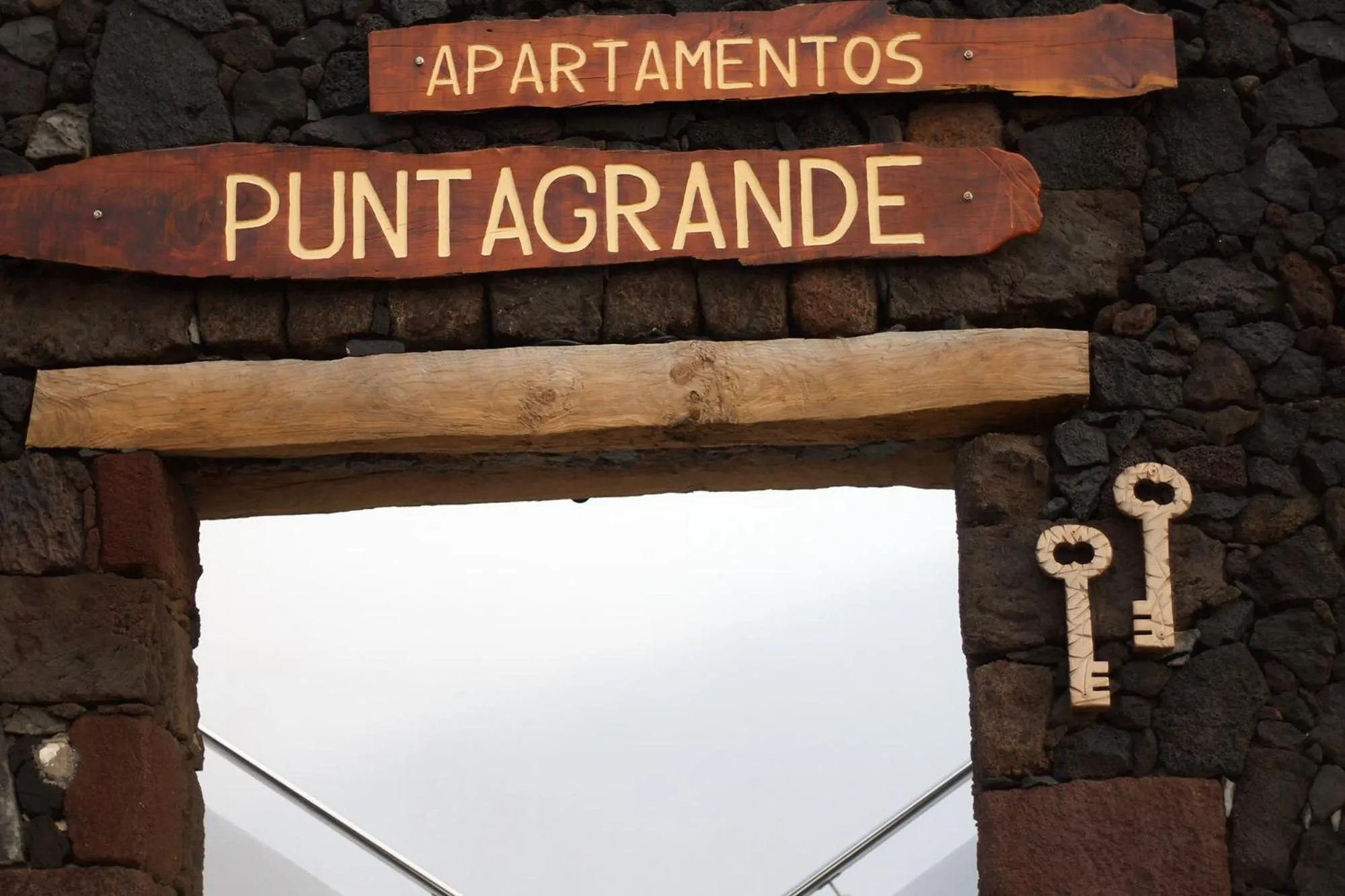 Property logo or sign in Hotel Puntagrande