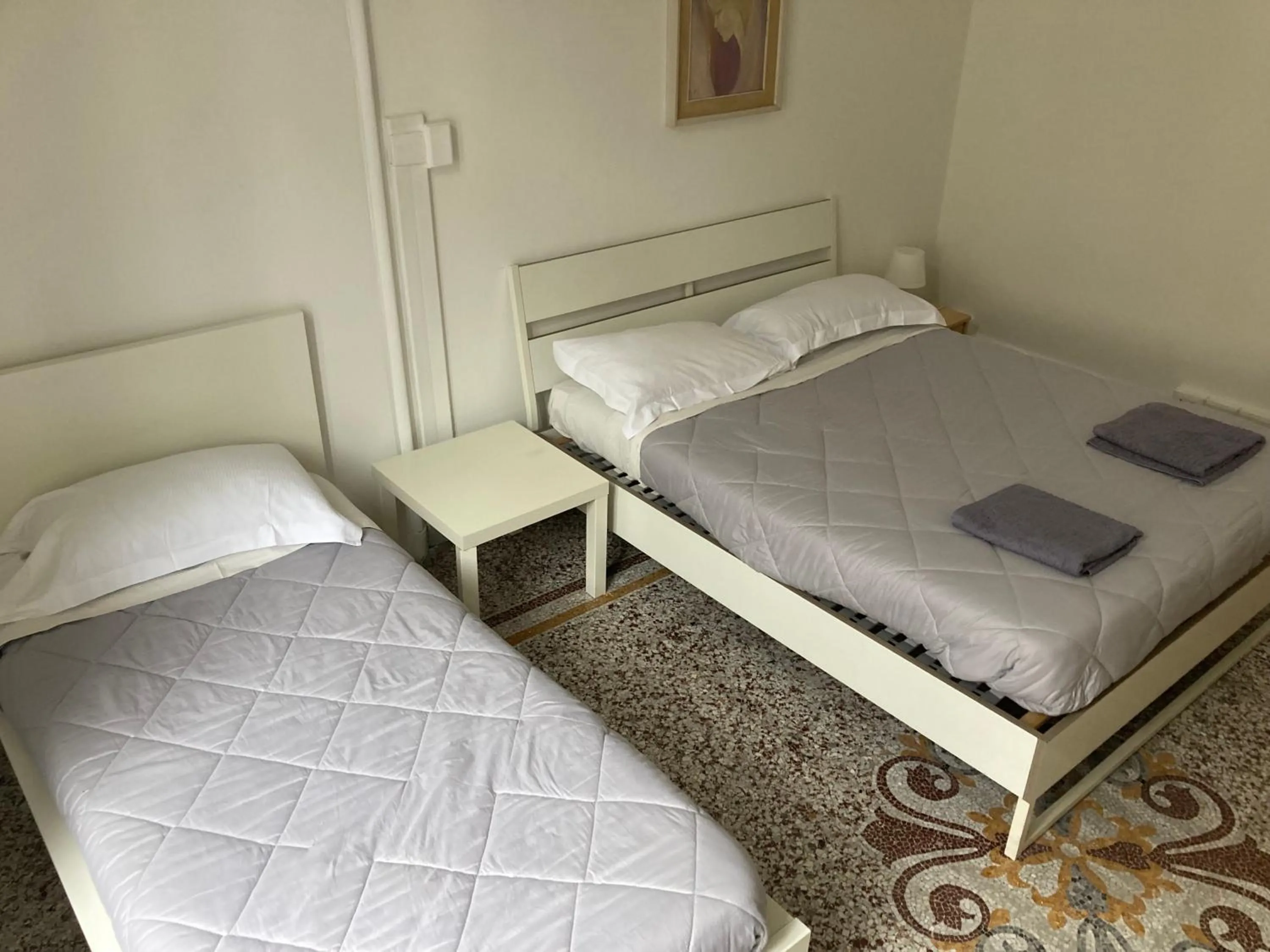 Bed in Guest House Roma