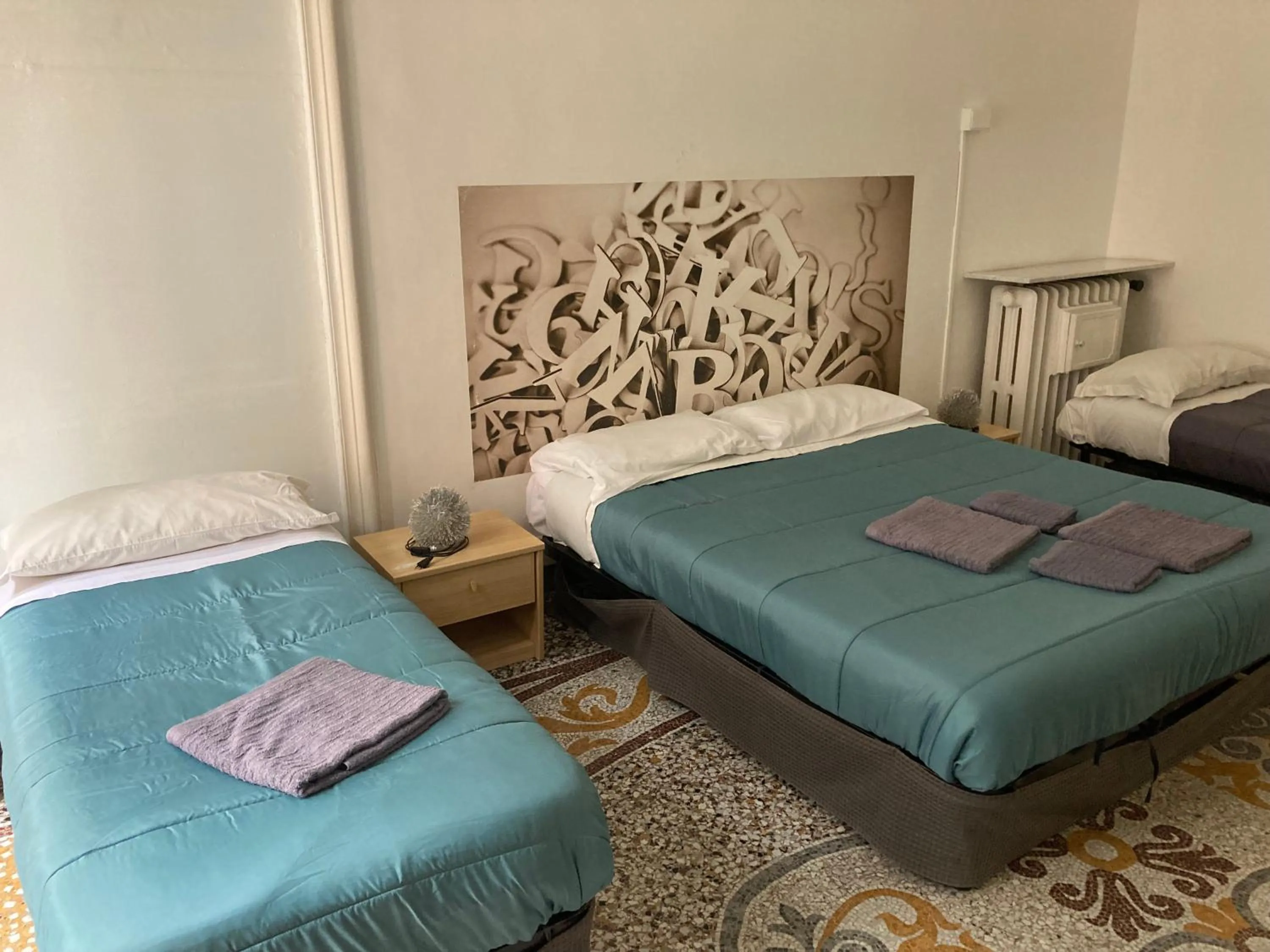 Bed in Guest House Roma