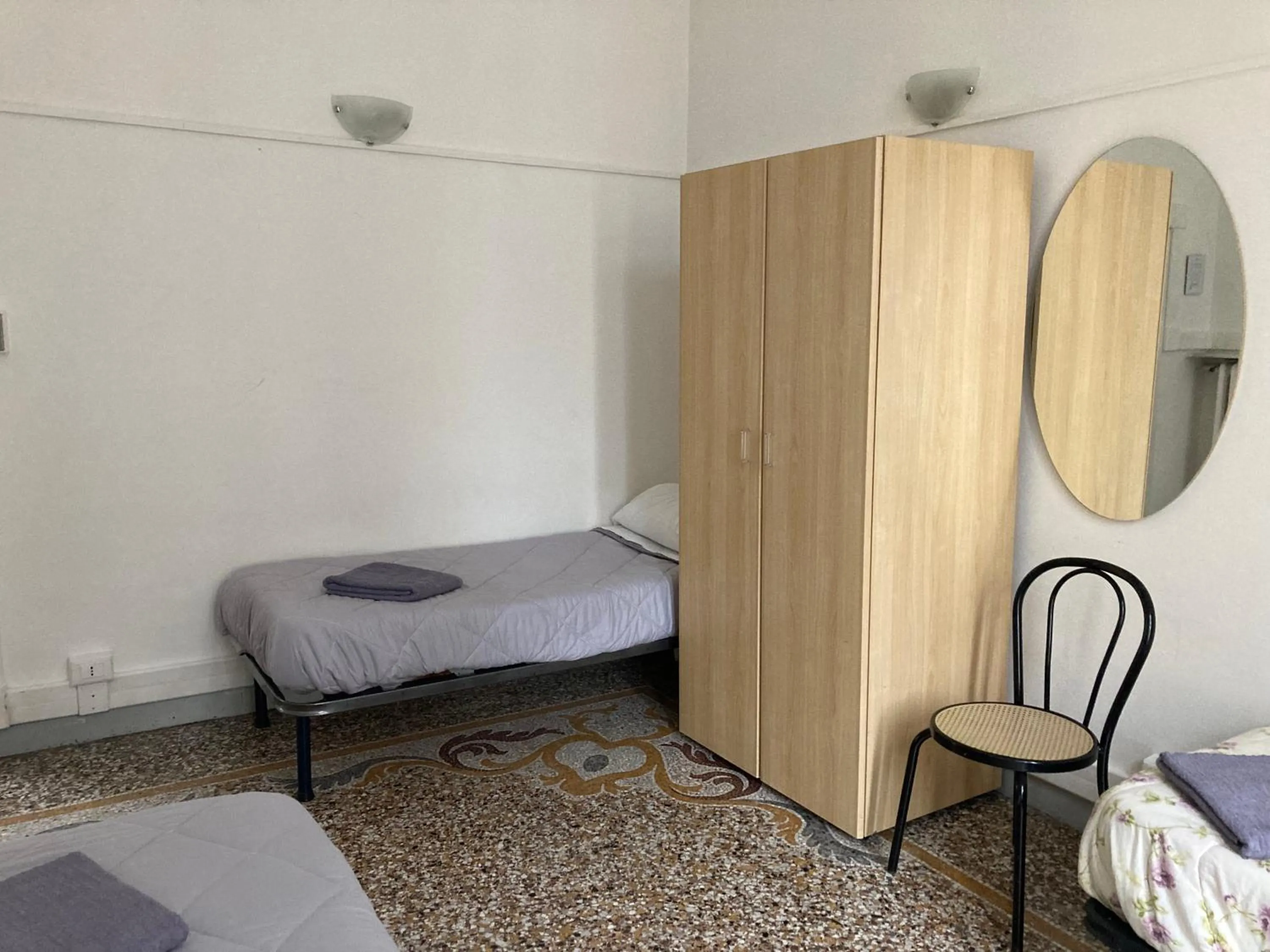 Bed in Guest House Roma