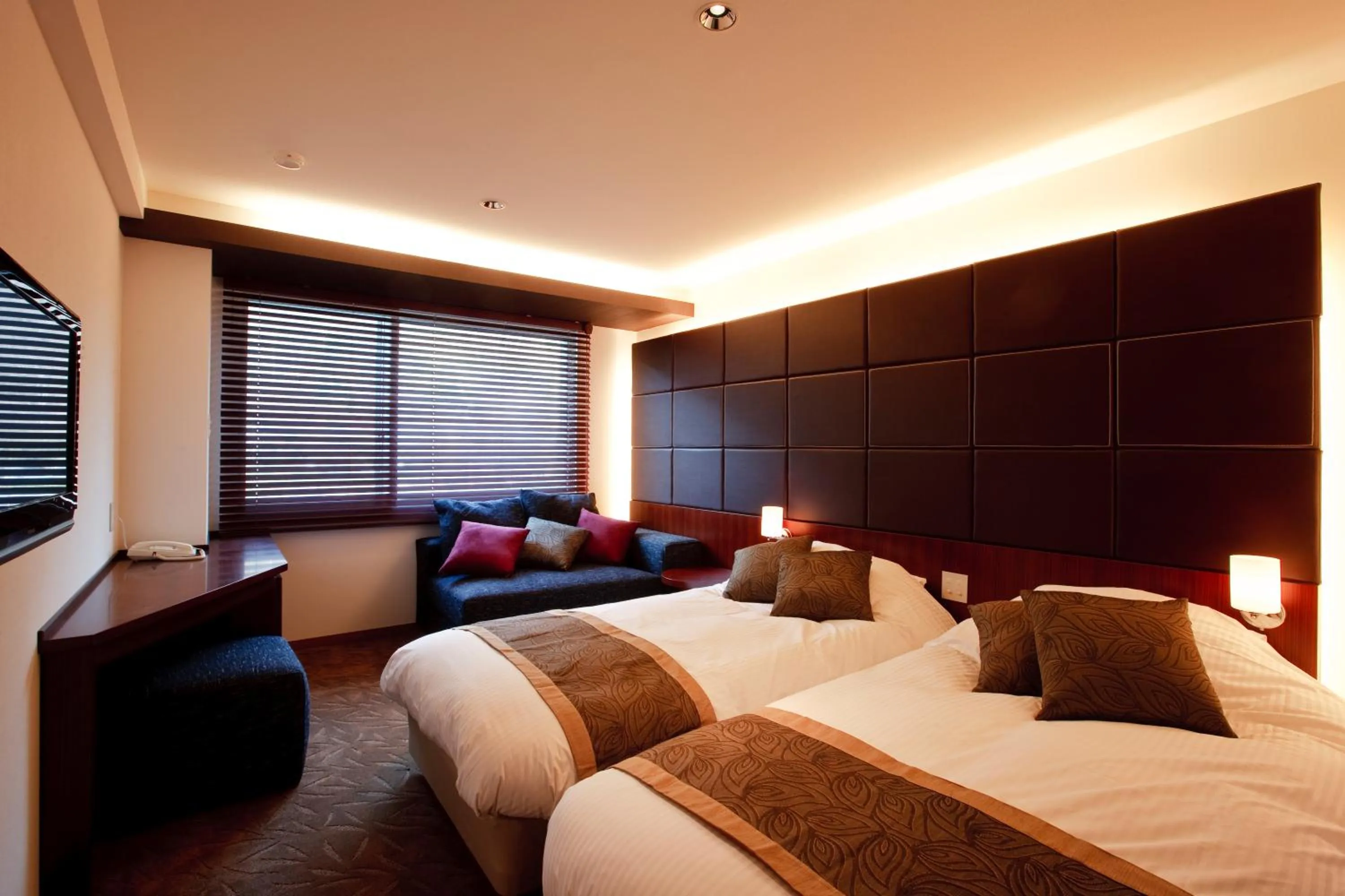 Bed in Choyo Resort Hotel