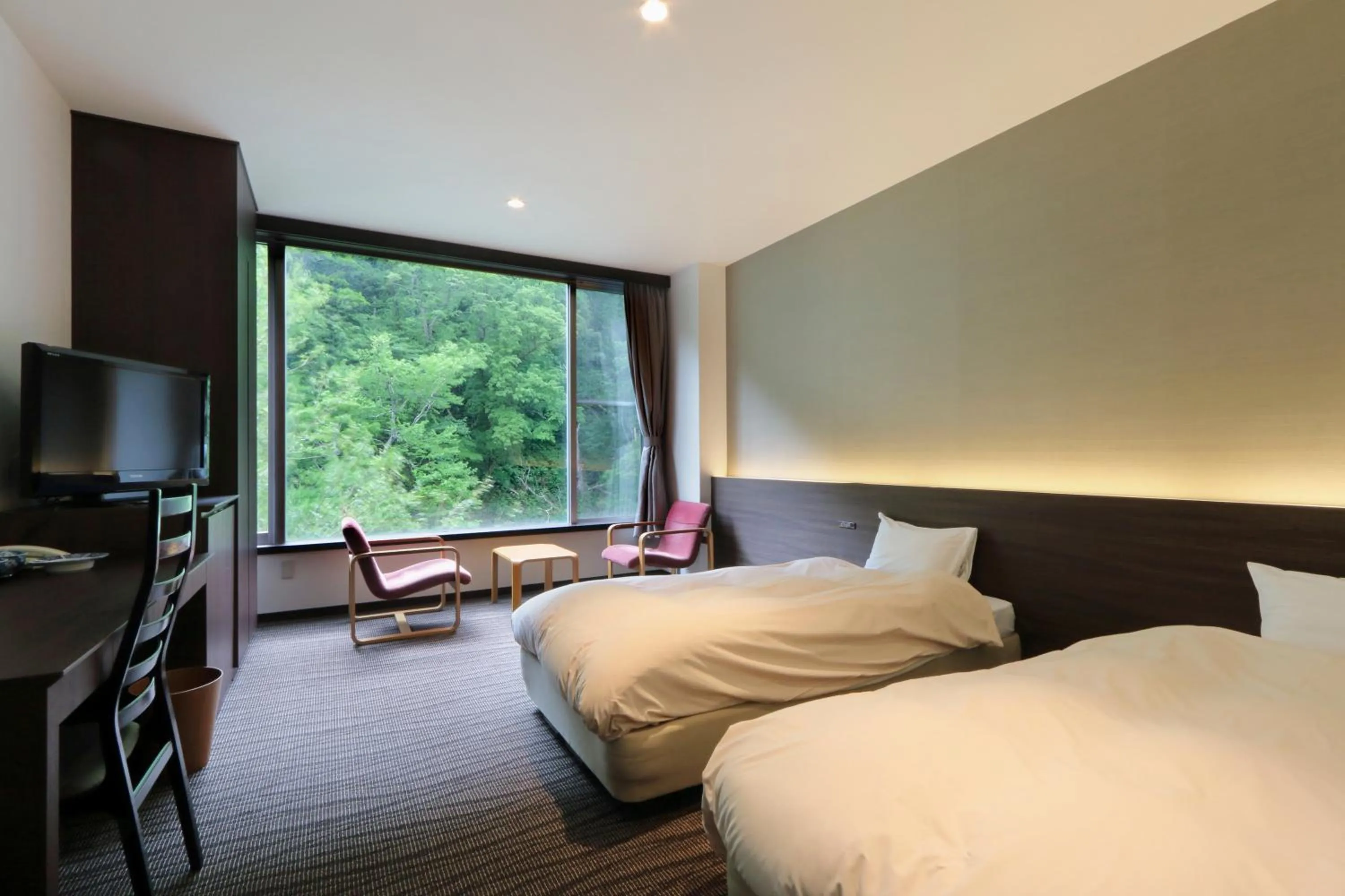 Photo of the whole room, Bed in Choyo Resort Hotel