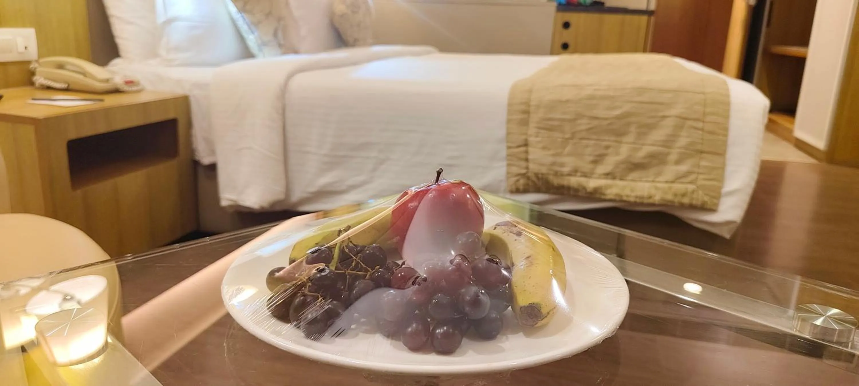 room service, Bed in Royal Orchid Central Vadodara