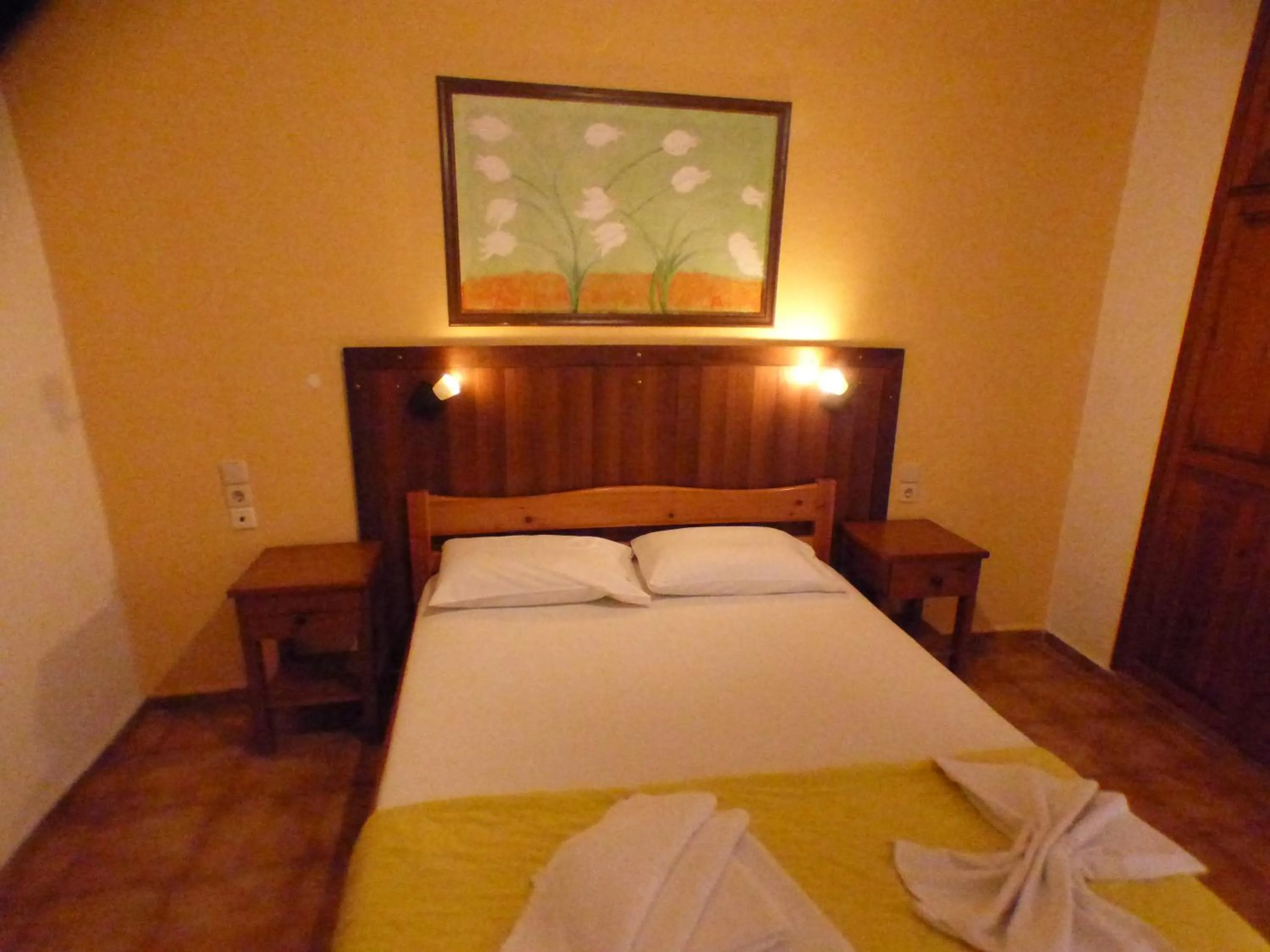 Bed in Eleni Apartments