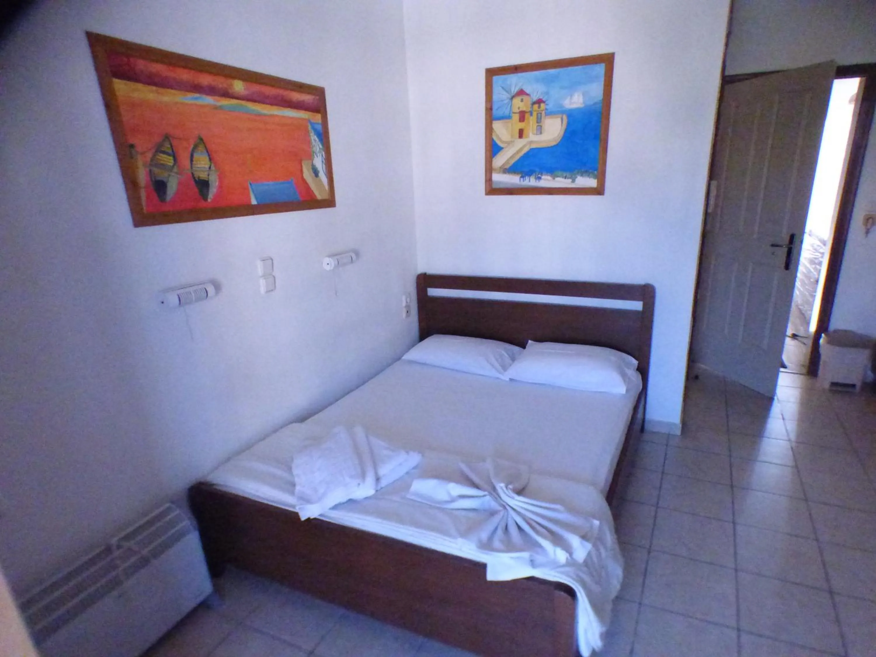 Bed in Eleni Apartments