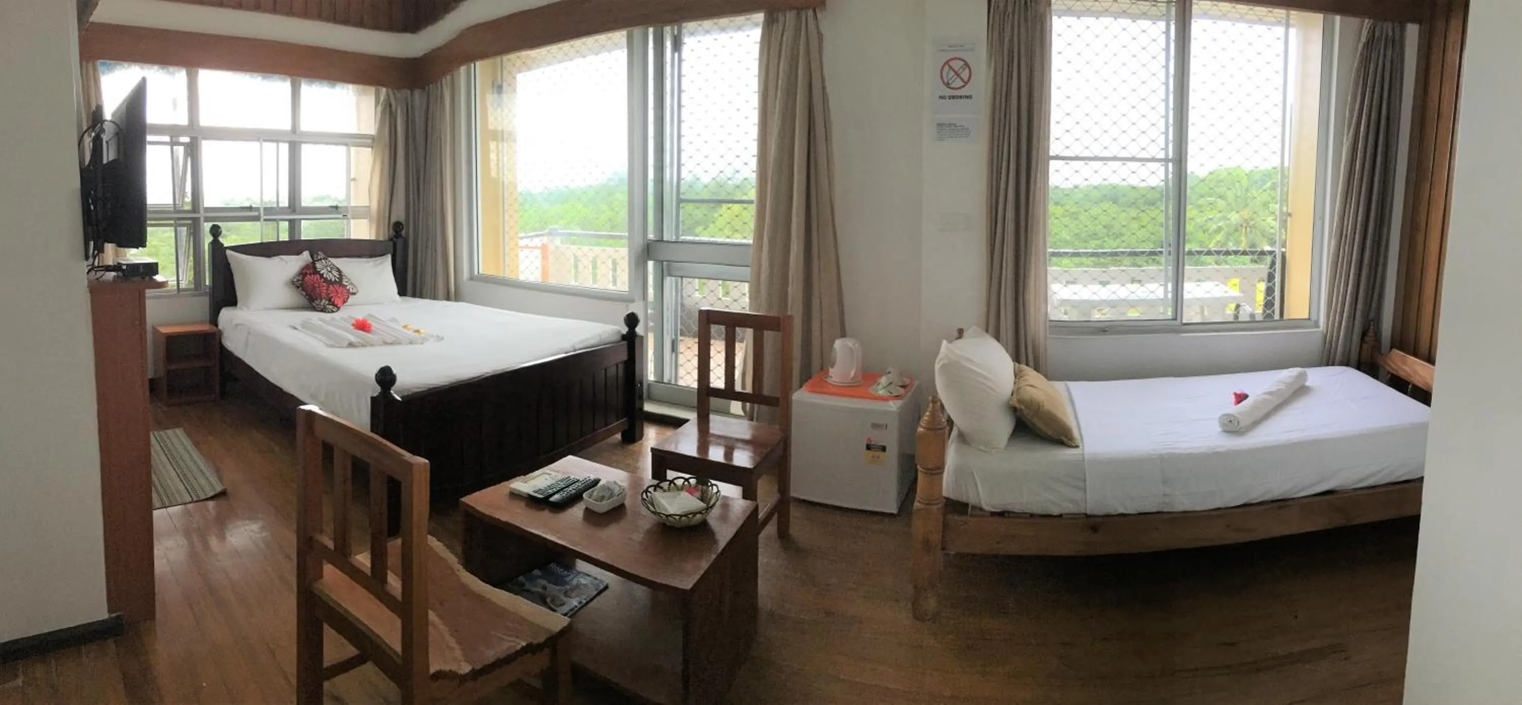 Bed in Tagimoucia House Hotel