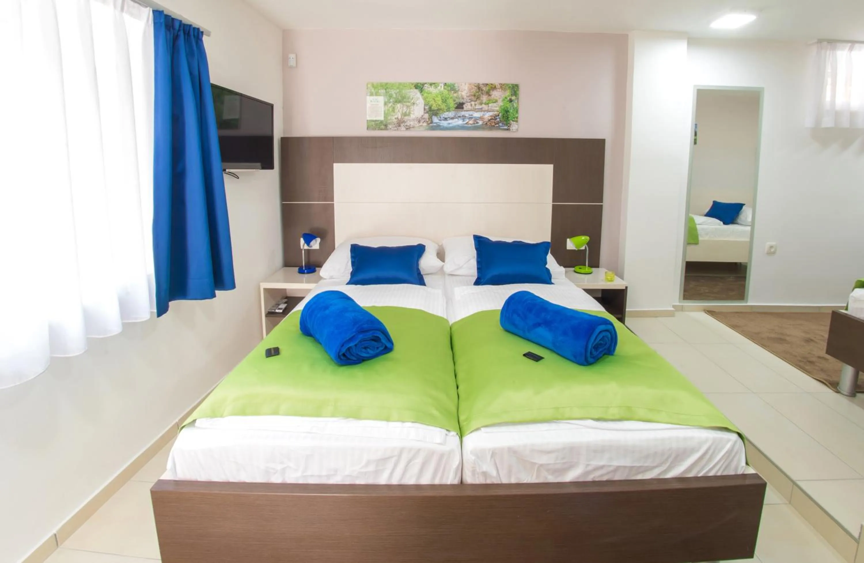 TV and multimedia, Bed in Five Rivers Rooms