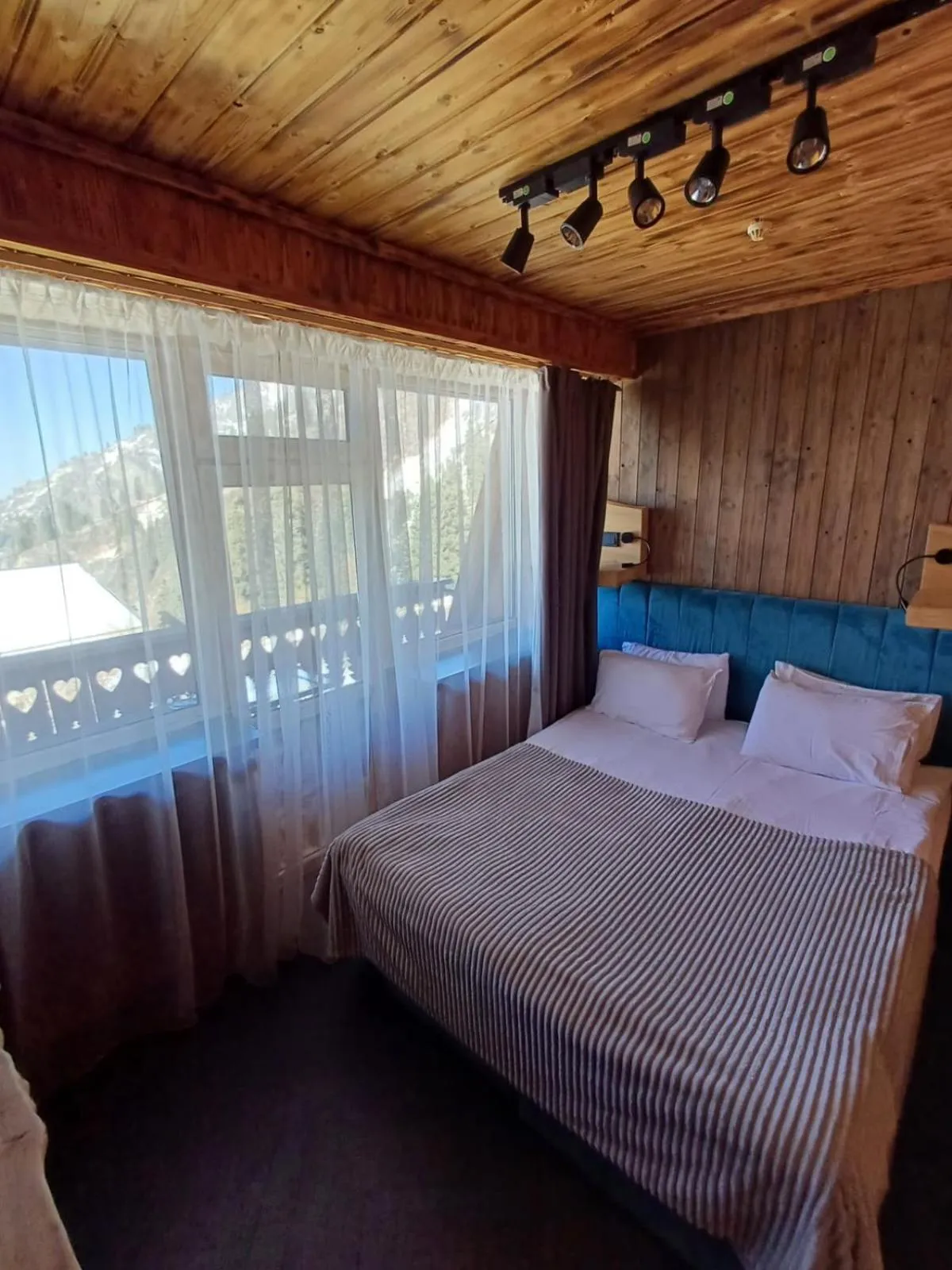 Bed in Shymbulak Resort Hotel