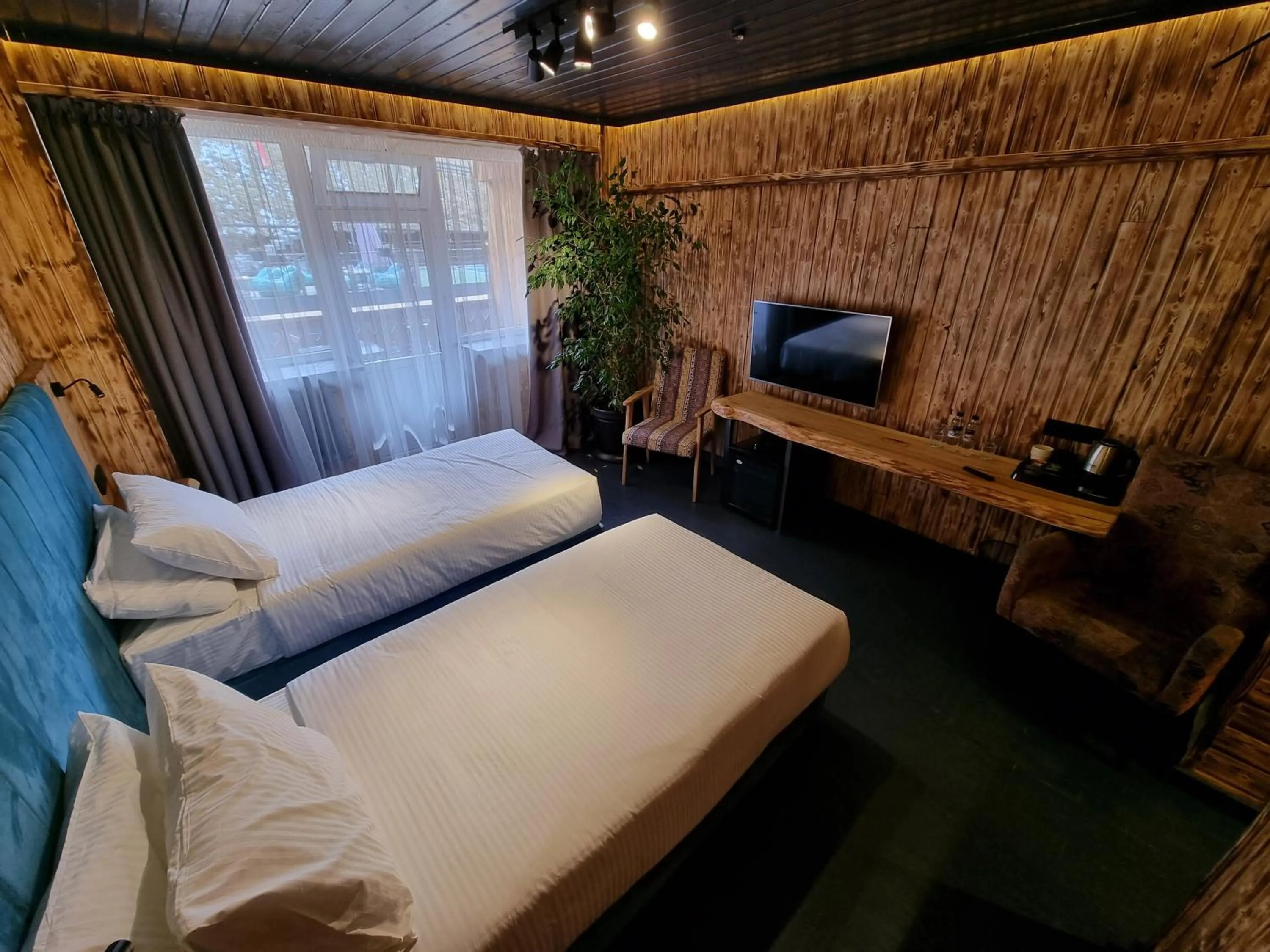 Bed in Shymbulak Resort Hotel