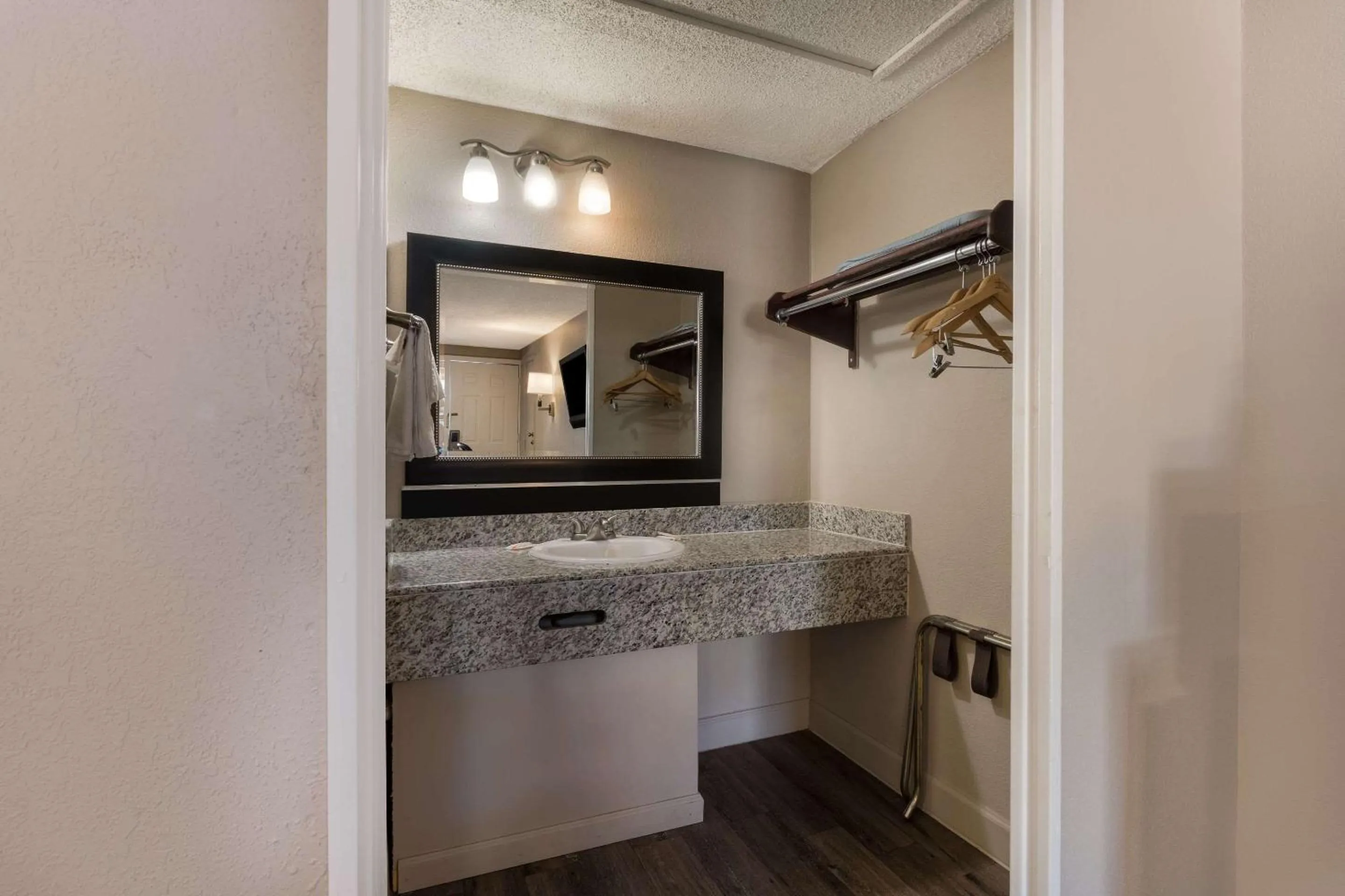 Bedroom in Rodeway Inn Charlotte Airport Area