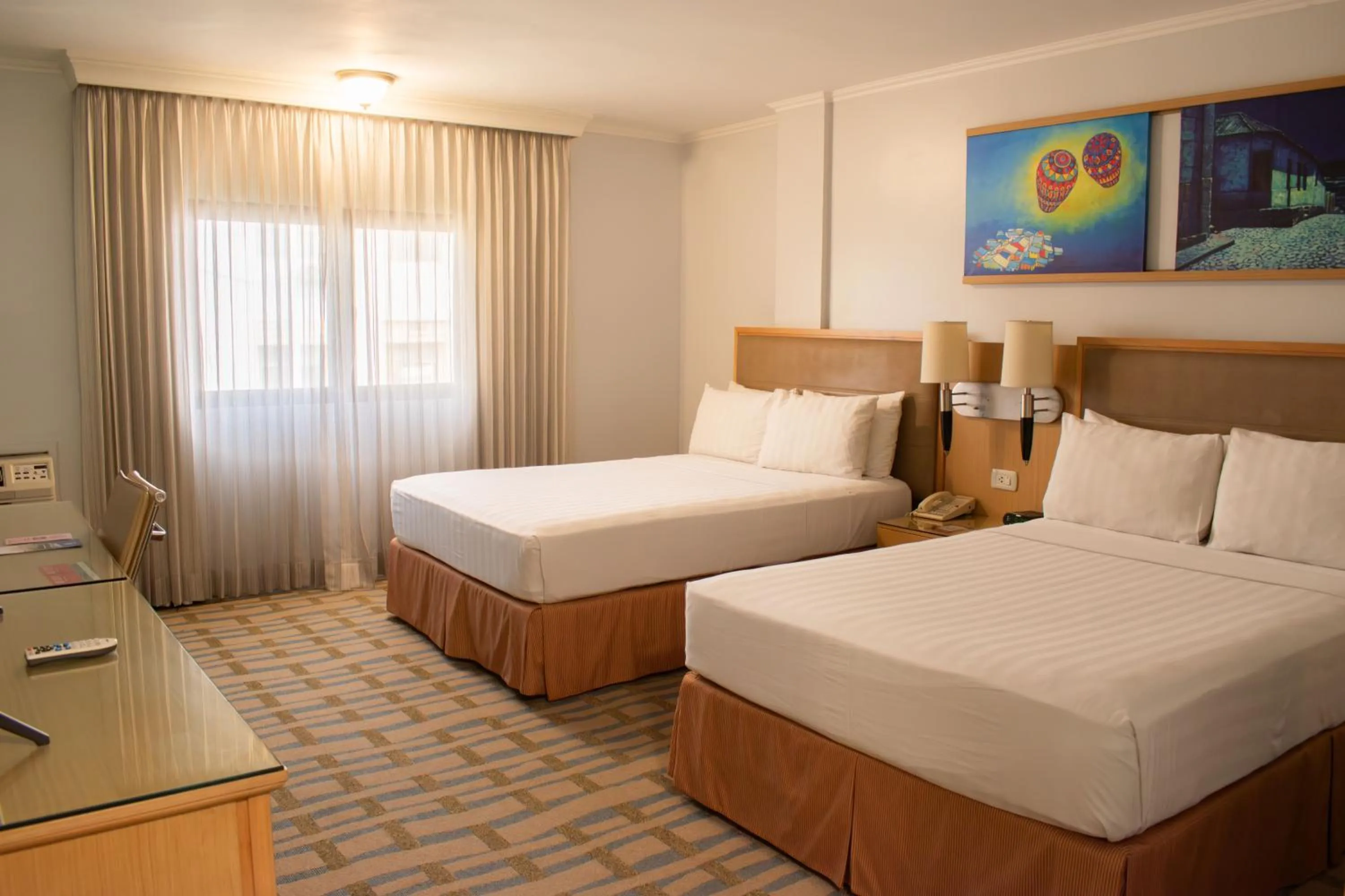 Bed in Grand Hotel Guayaquil, an Ascend Collection Hotel