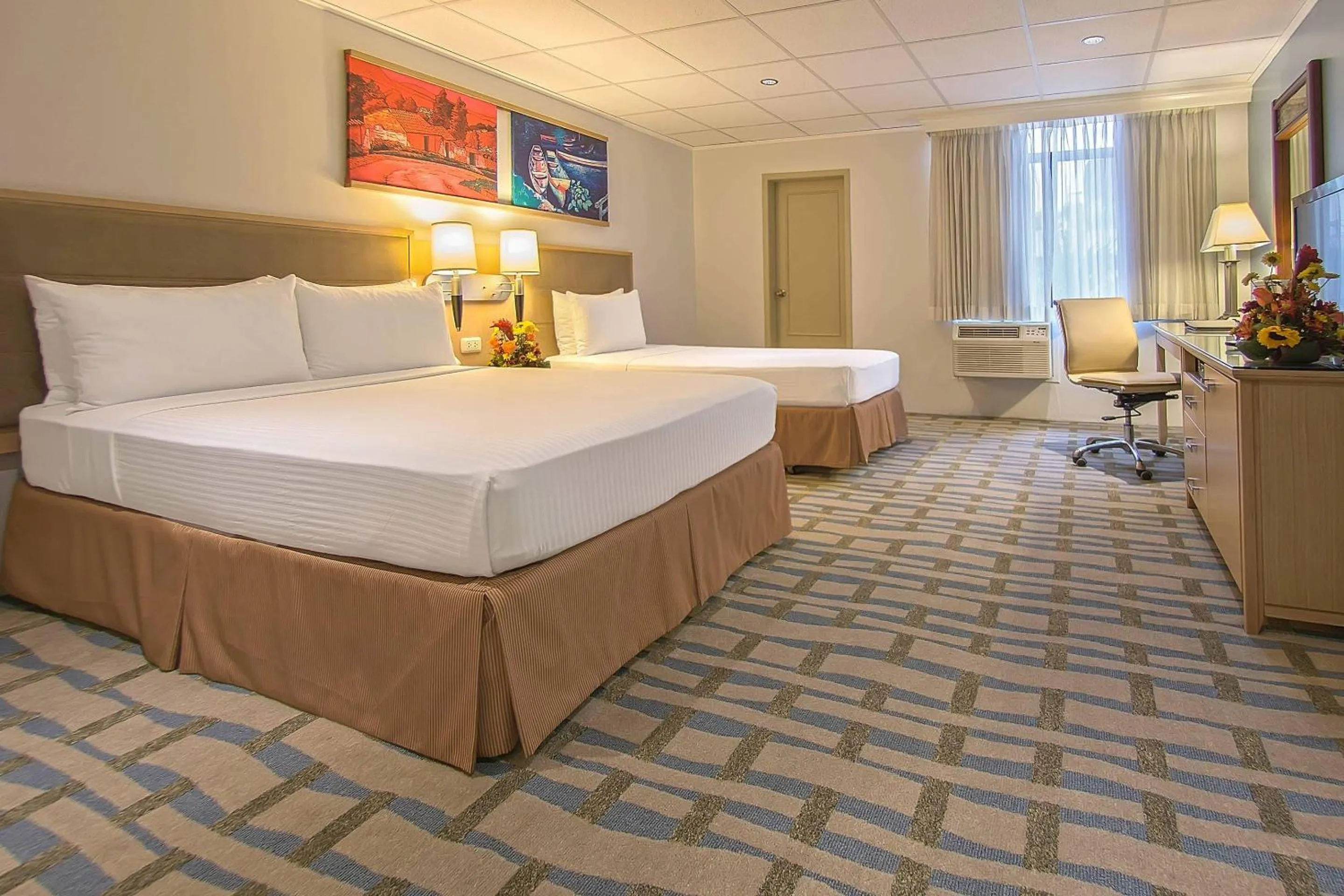 Bedroom, Bed in Grand Hotel Guayaquil, an Ascend Collection Hotel