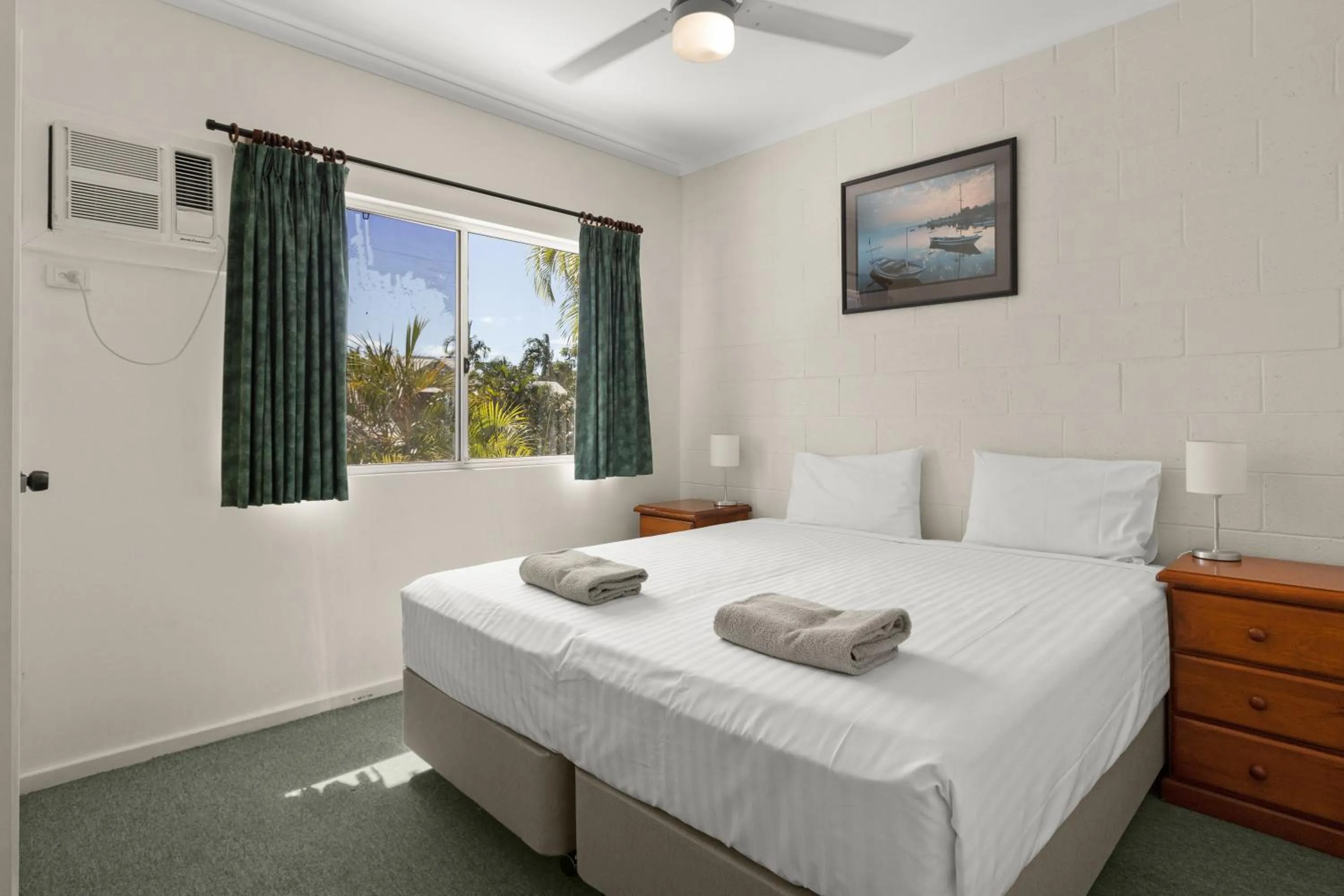 Bed in Cable Beachside Villas