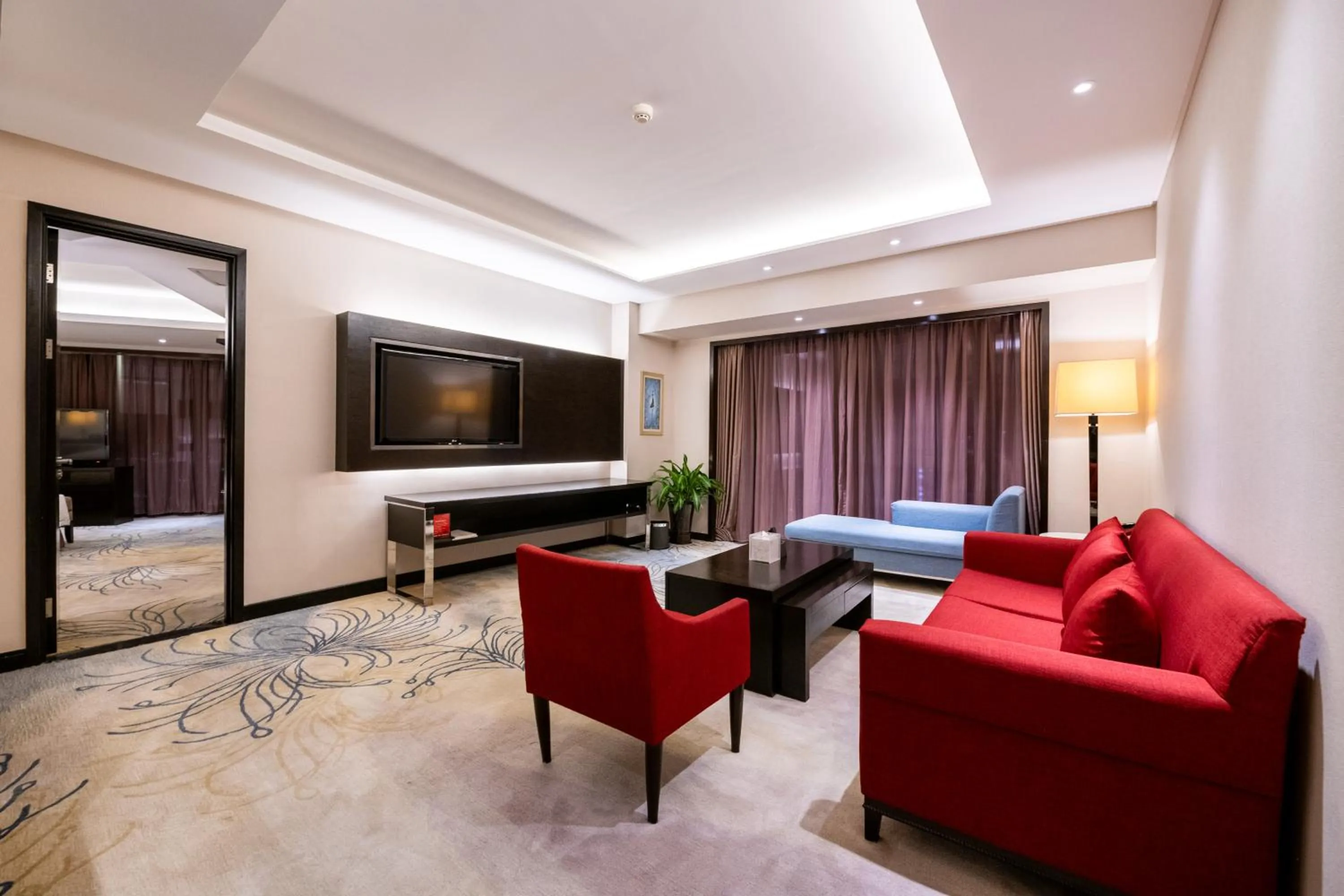 Living room, Bed in Pullman Guiyang