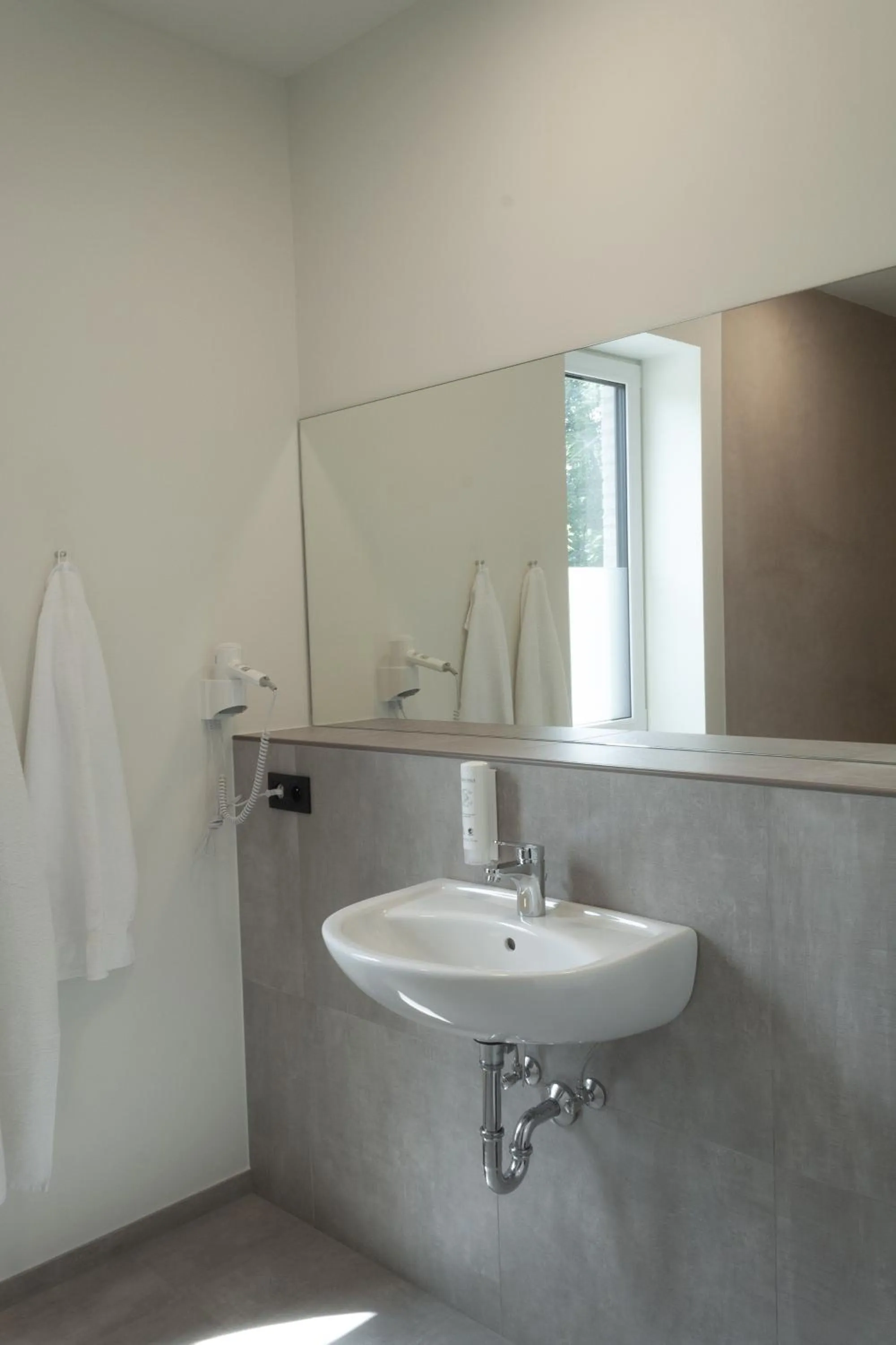 Bathroom in Hotel Restaurant Tychon AG